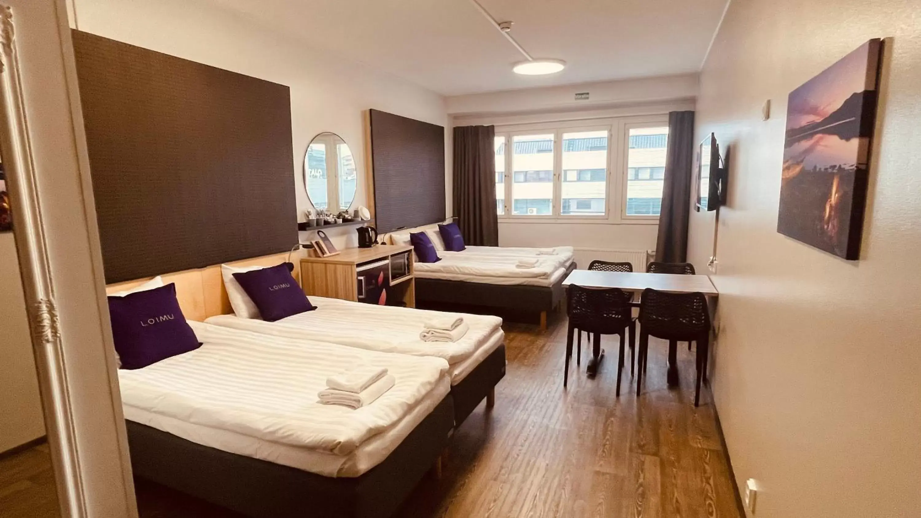 Comfort Quadruple Room in Hotelli Loimu by UHANDA Comfort Quadruple Room in Hotelli Loimu by UHANDA