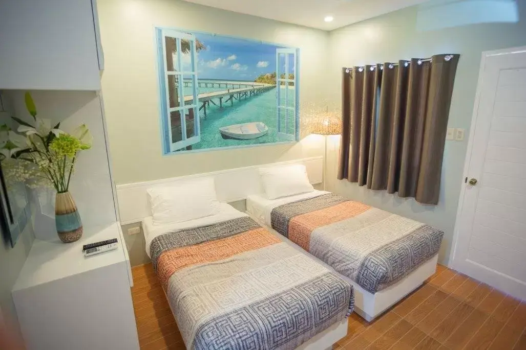 Deluxe Twin Room with Sea View in Tropical Fun Ta Sea Rentals Deluxe Twin Room with Sea View in Tropical Fun Ta Sea Rentals