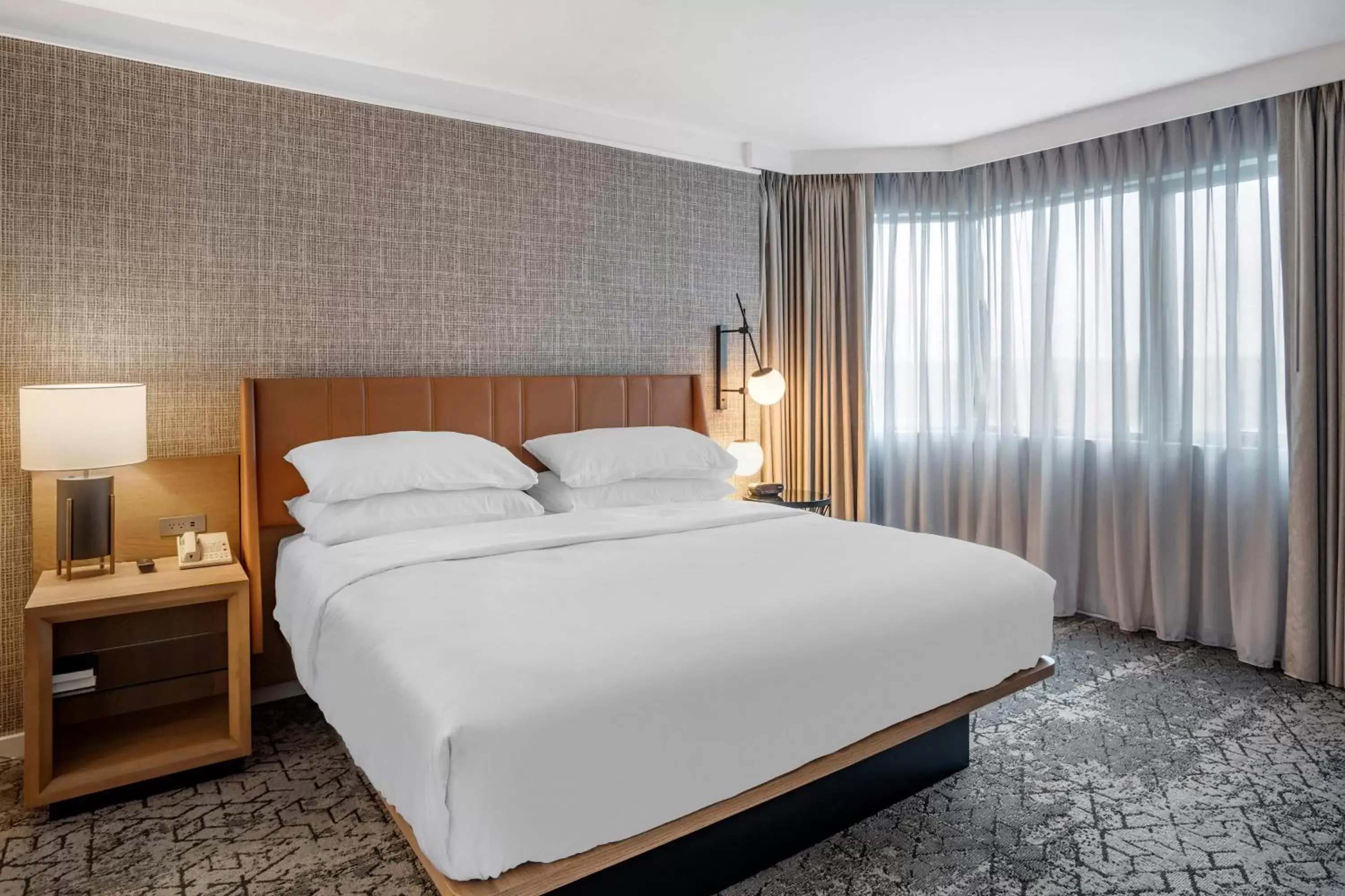 King Suite with Sofa Bed and Roll-in Shower - Mobility Accessible in Sheraton Suites Wilmington Downtown King Suite with Sofa Bed and Roll-in Shower - Mobility Accessible in Sheraton Suites Wilmington Downtown