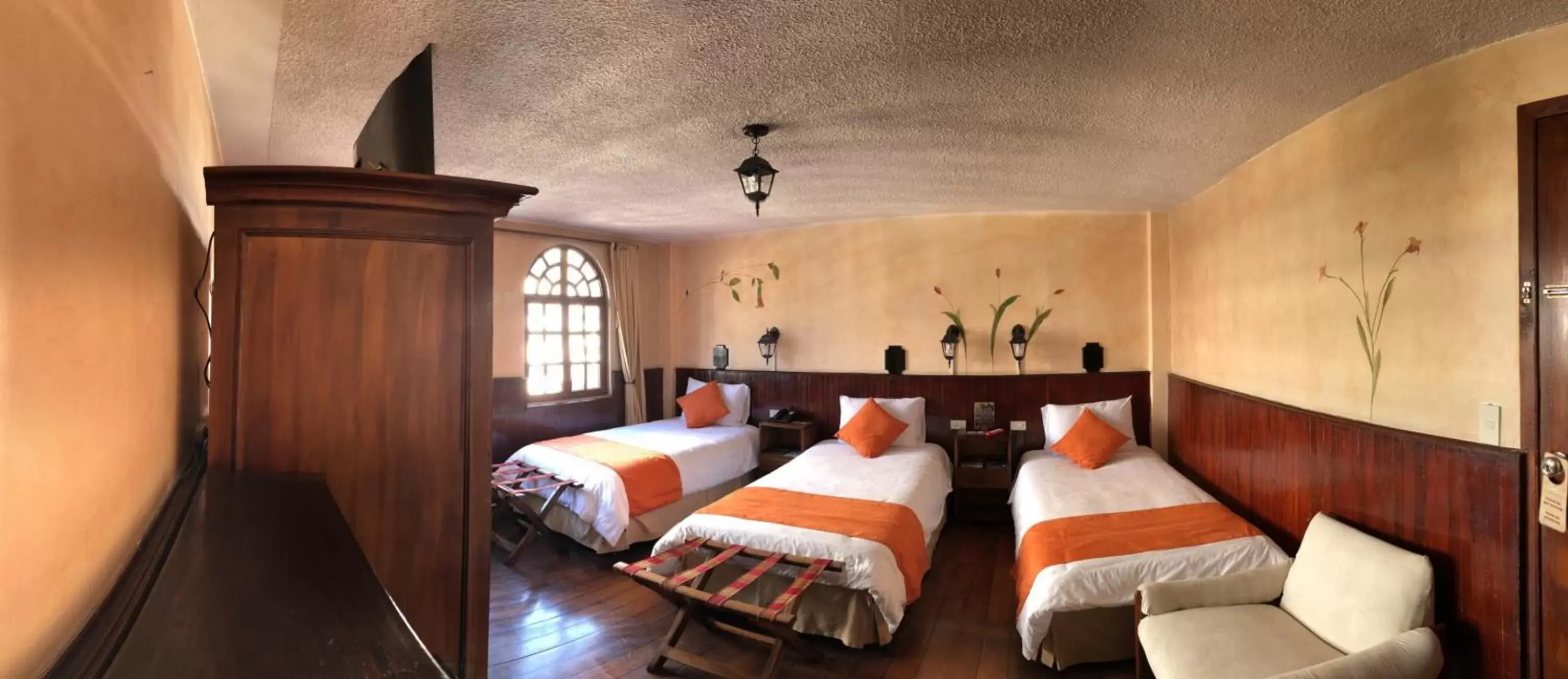 Standard Triple Room in Kitu Hotel Standard Triple Room in Kitu Hotel