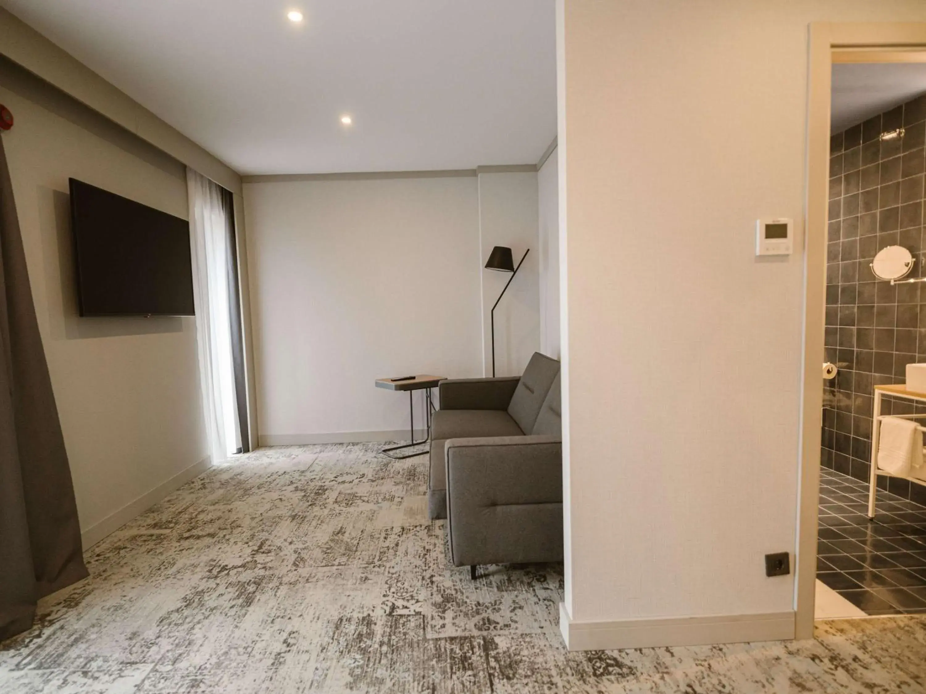 Suite with One Double Bed and Sofa Bed in Mercure Sibiu Arsenal Suite with One Double Bed and Sofa Bed in Mercure Sibiu Arsenal