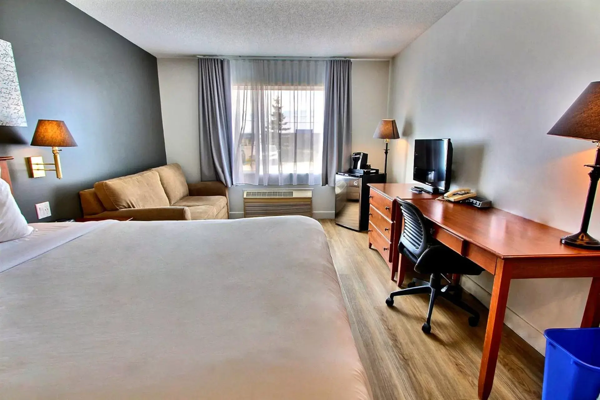 Classic Quadruple Room in Hôtel l'Empress Classic Quadruple Room in Hôtel l'Empress