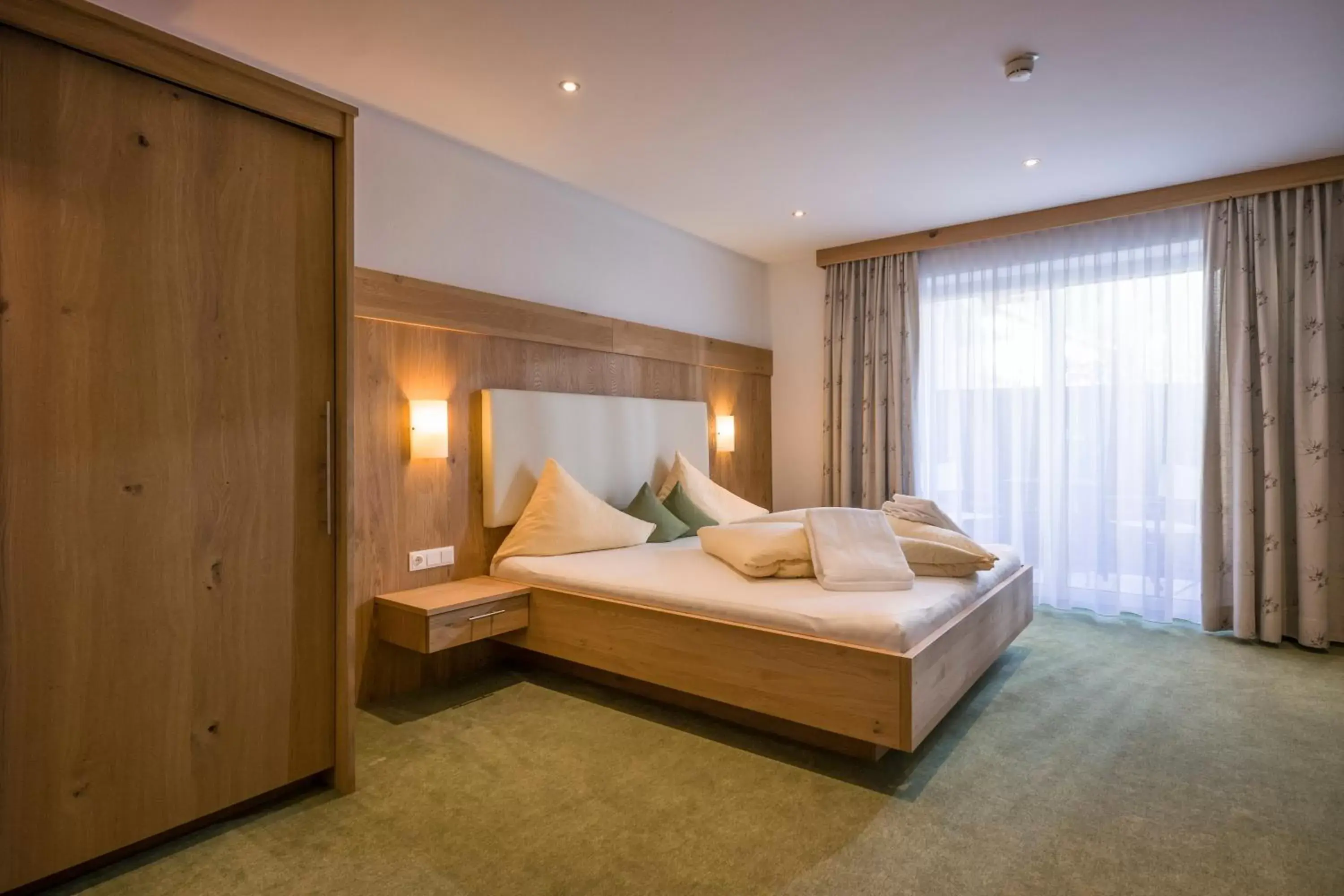 Superior Double Room in Alpenhof Hotel Garni Suprême Superior Double Room in Alpenhof Hotel Garni Suprême