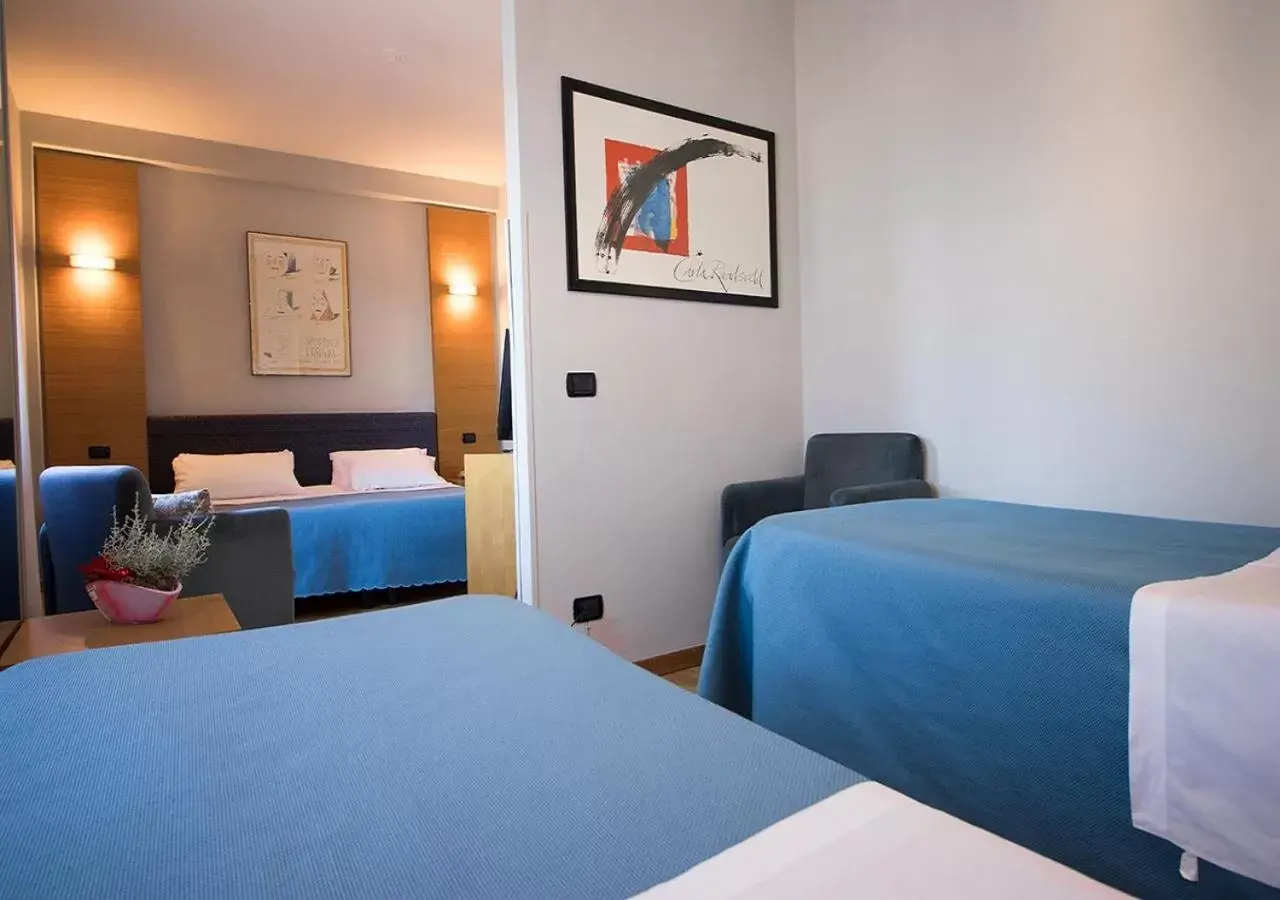 Quadruple Room in Hotel Clarici Quadruple Room in Hotel Clarici