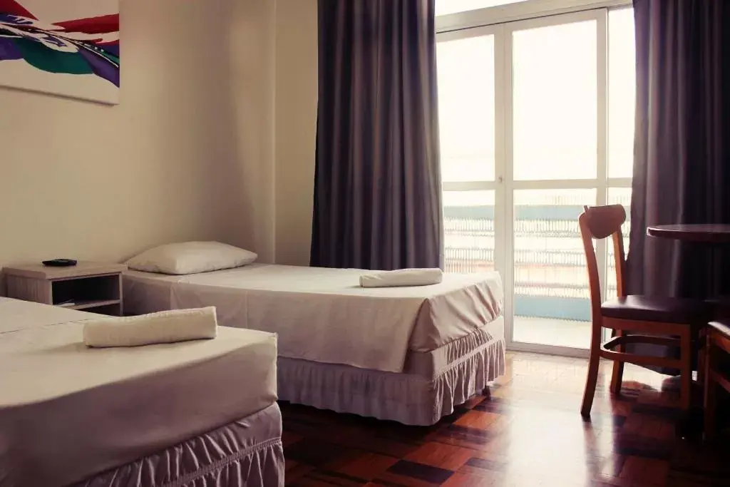 Family Room with Balcony in Hotel Vitoria - Itajaí Family Room with Balcony in Hotel Vitoria - Itajaí