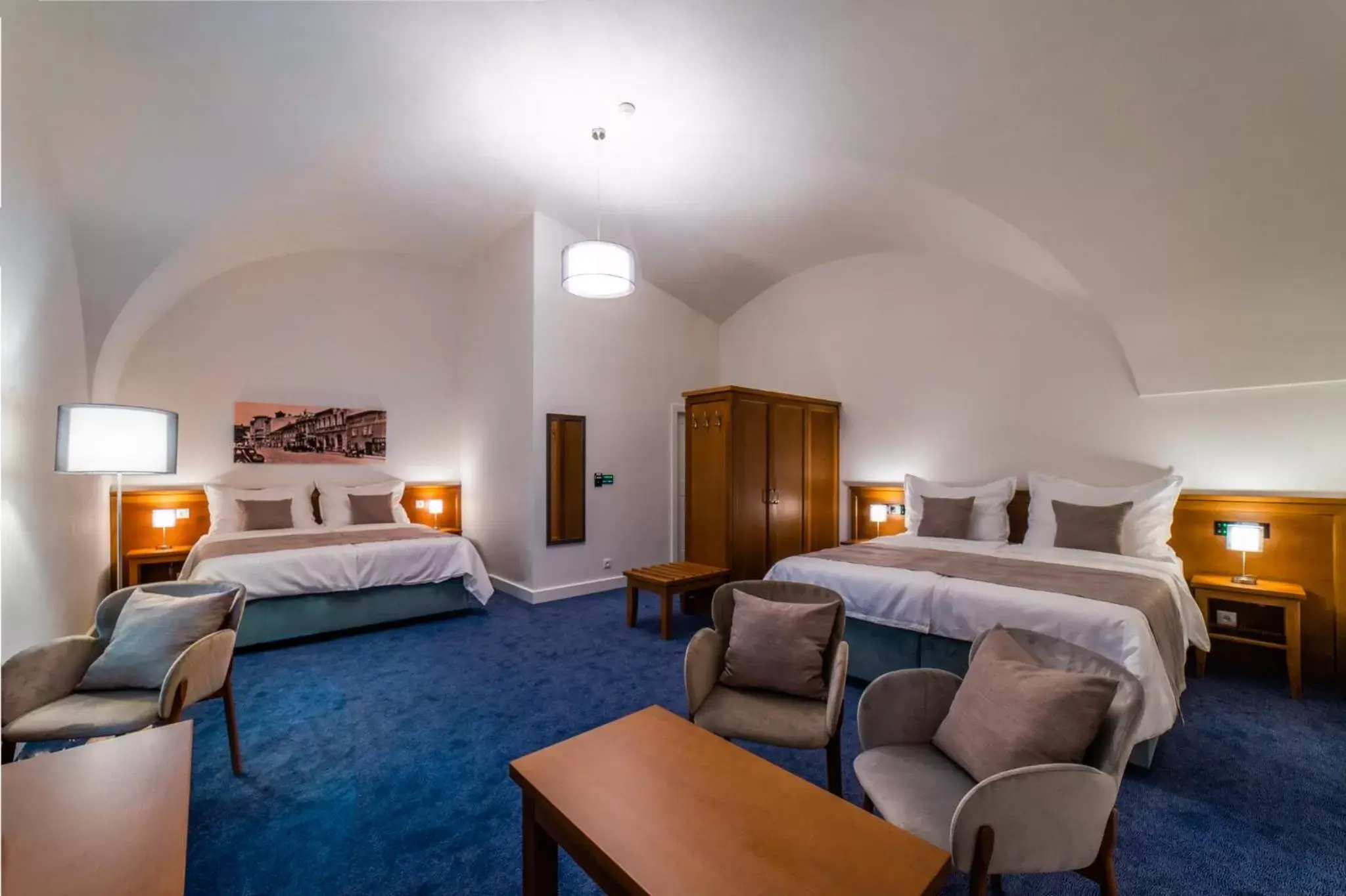 Deluxe Quadruple Room in Hotel Panský Pivovar Deluxe Quadruple Room in Hotel Panský Pivovar