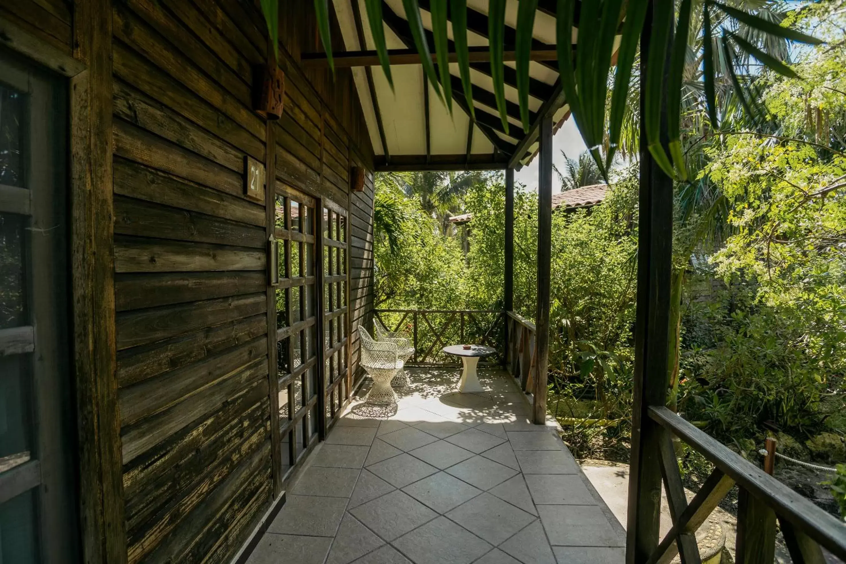 Garden view Bungalow - Double Beds in Petit Lafitte Beach Front Hotel & Bungalows Garden view Bungalow - Double Beds in Petit Lafitte Beach Front Hotel & Bungalows