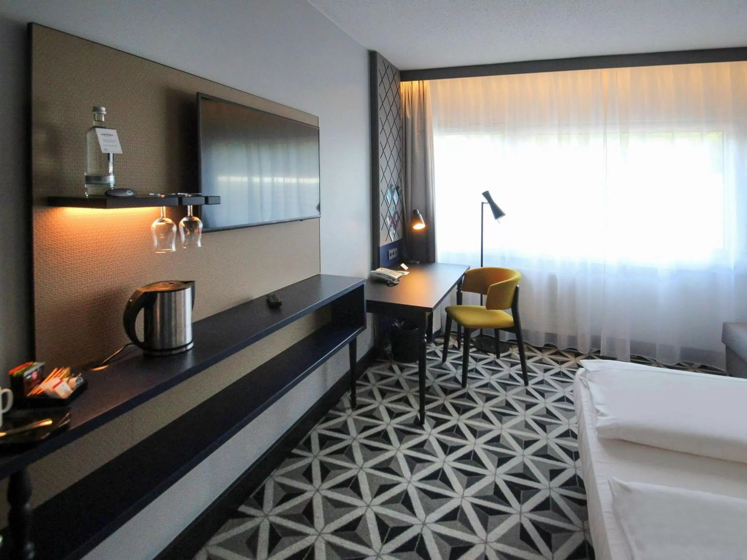 Standard Room with Double and Armchair Bed in Mercure Hotel Freiburg am Münster Standard Room with Double and Armchair Bed in Mercure Hotel Freiburg am Münster