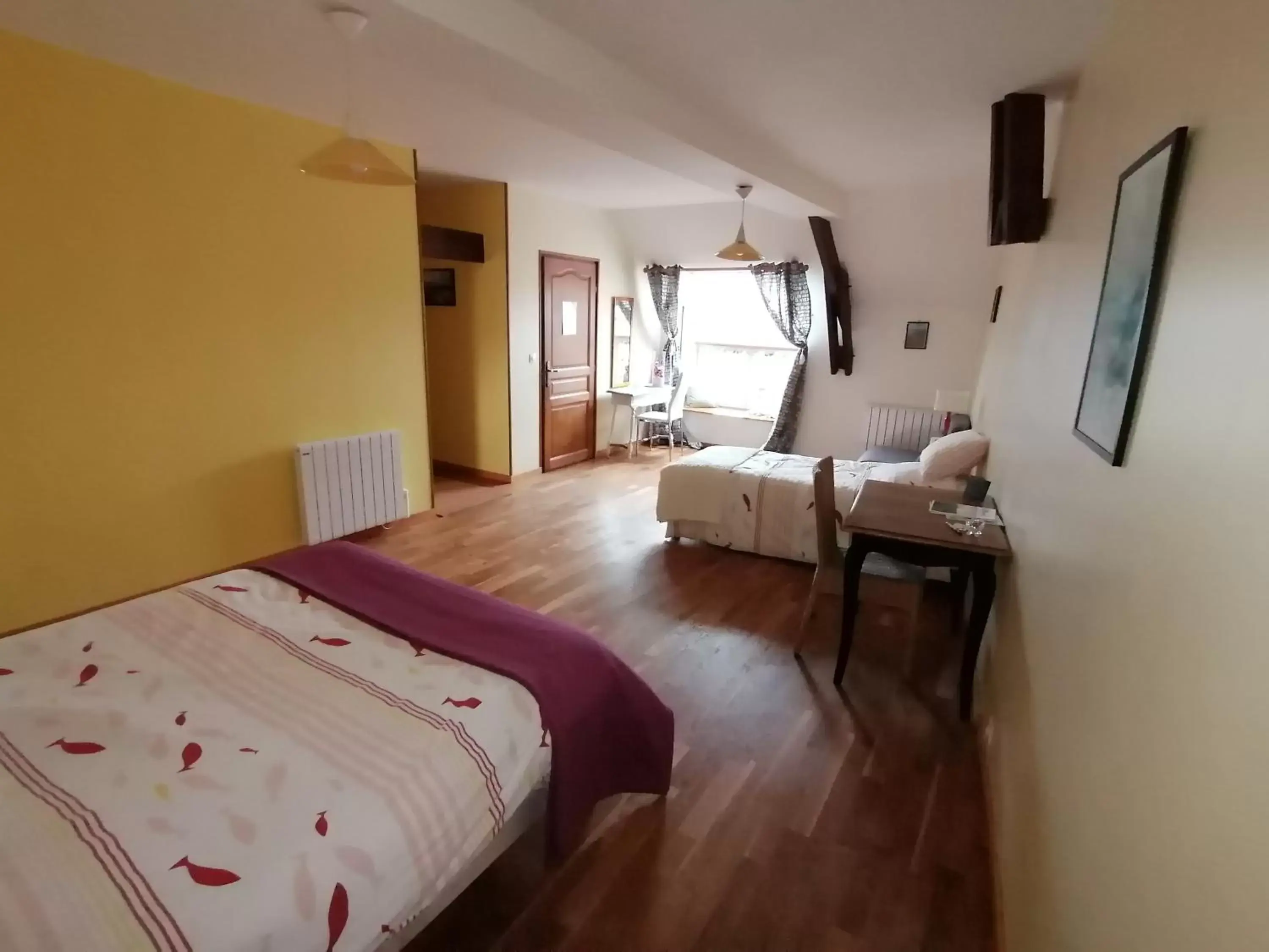 Triple Room in La Parisière Triple Room in La Parisière