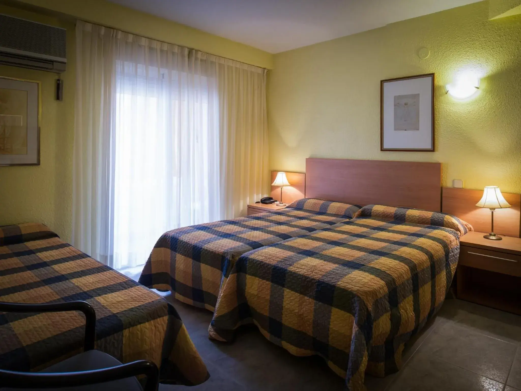 Triple Room (2 Adults + 1 Child ) in Felipe II Triple Room (2 Adults + 1 Child ) in Felipe II