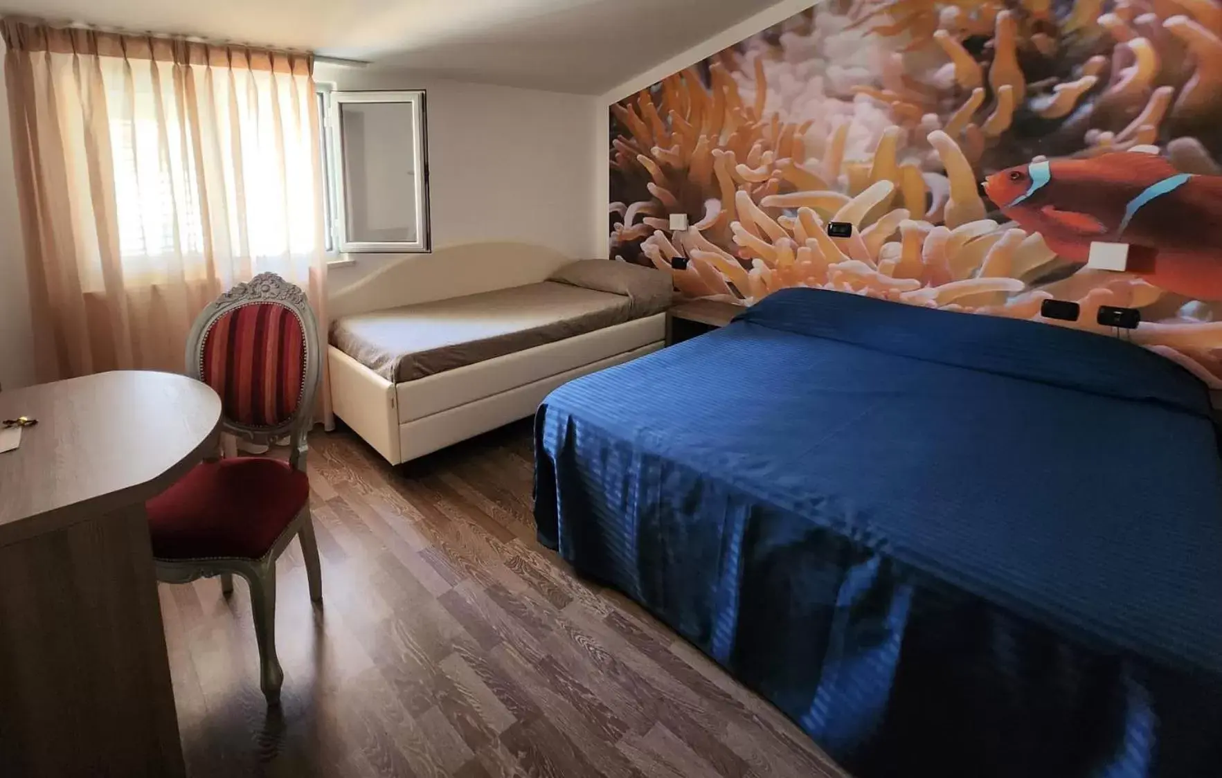 Quadruple Room with Terrace in Hotel Miramare Dipendenza Quadruple Room with Terrace in Hotel Miramare Dipendenza