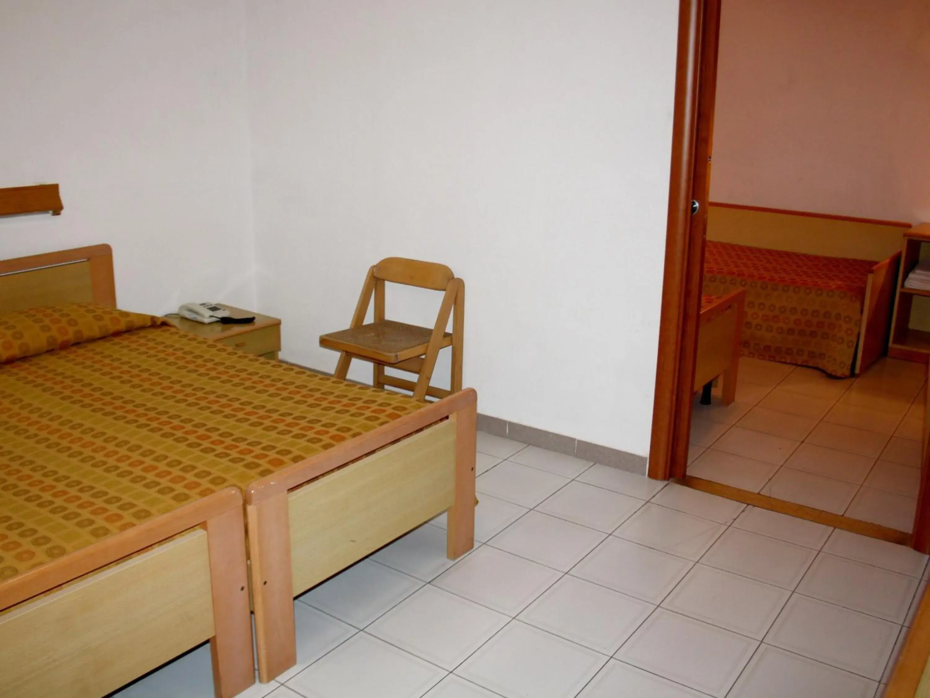 Quadruple Room in Hotel La Filadelfia Quadruple Room in Hotel La Filadelfia