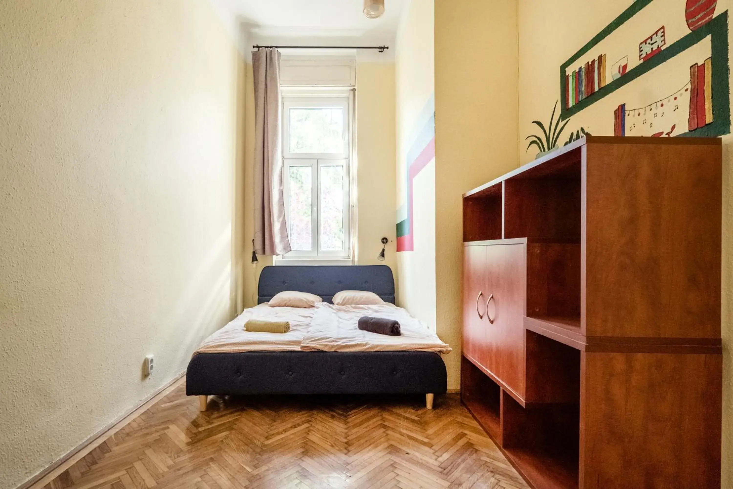 Budget Twin Room with Shared Bathroom in Baroque Hostel & Coworking Budget Twin Room with Shared Bathroom in Baroque Hostel & Coworking