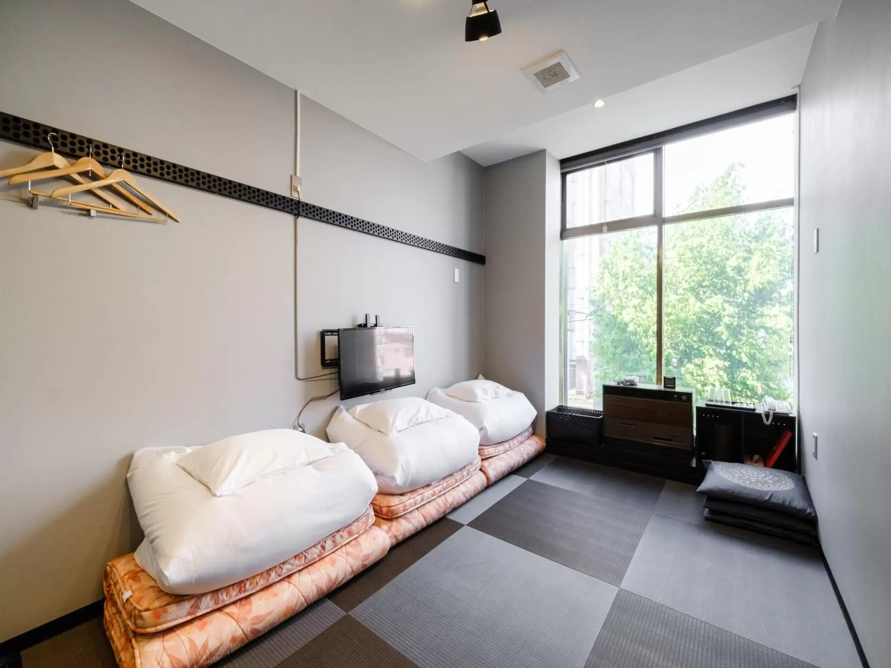 Japanese-Style Triple Room with Shared Bathroom - single occupancy - Non-Smoking in Tabist THE GREEN ASAHIKAWA Japanese-Style Triple Room with Shared Bathroom - single occupancy - Non-Smoking in Tabist THE GREEN ASAHIKAWA