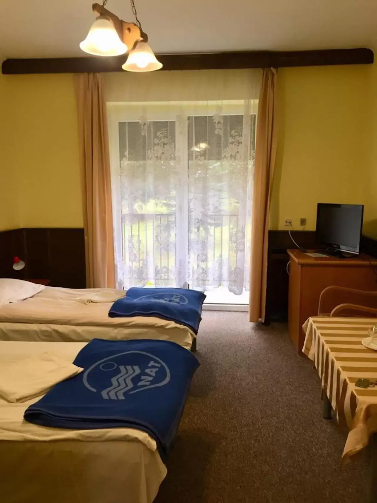 Twin Room with Balcony in OWR Relax - Hostel położony blisko atrakcji turystycznych Twin Room with Balcony in OWR Relax - Hostel położony blisko atrakcji turystycznych