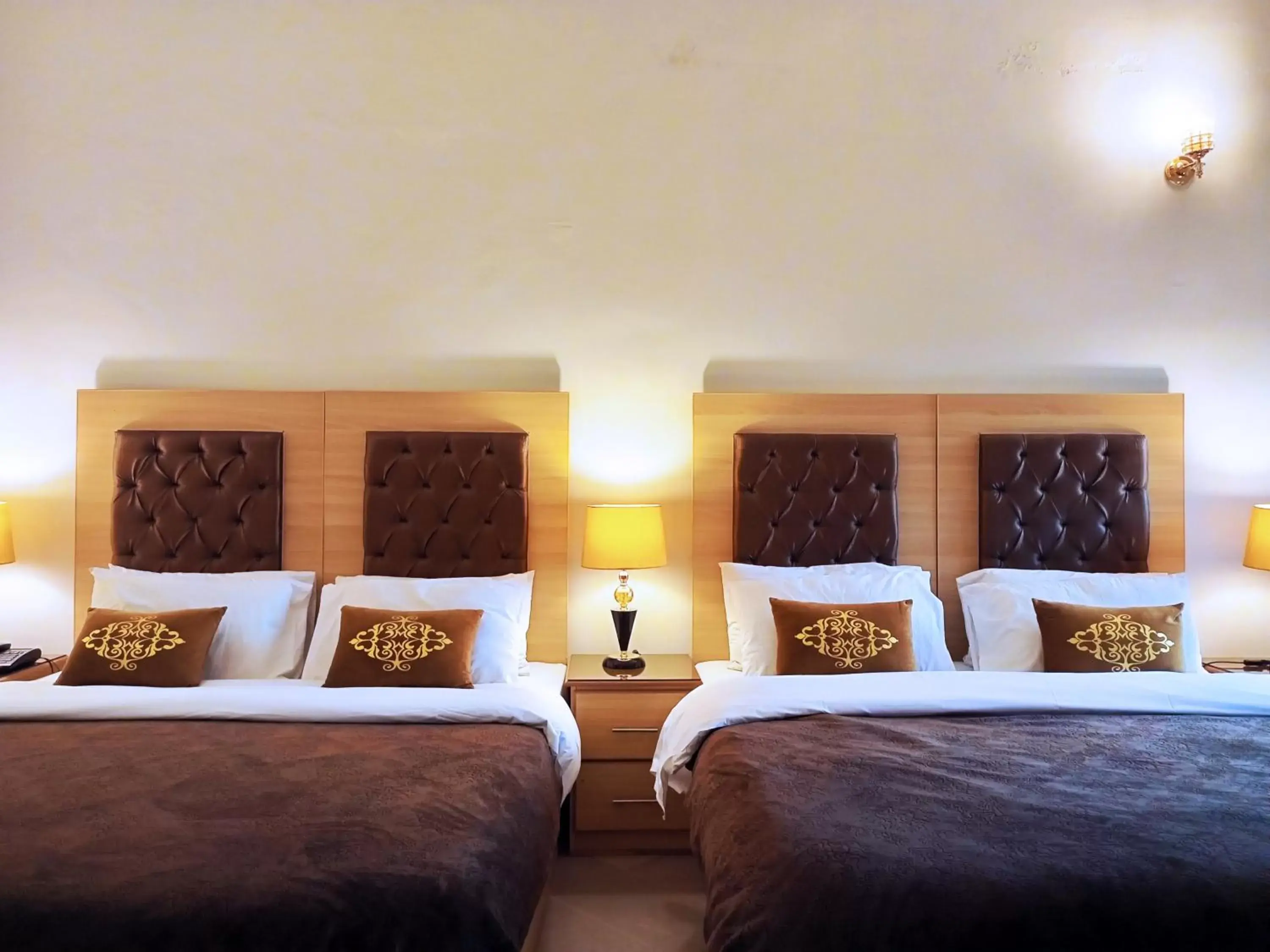 Quadruple Room with Private Bathroom in Grand Peace House II Quadruple Room with Private Bathroom in Grand Peace House II