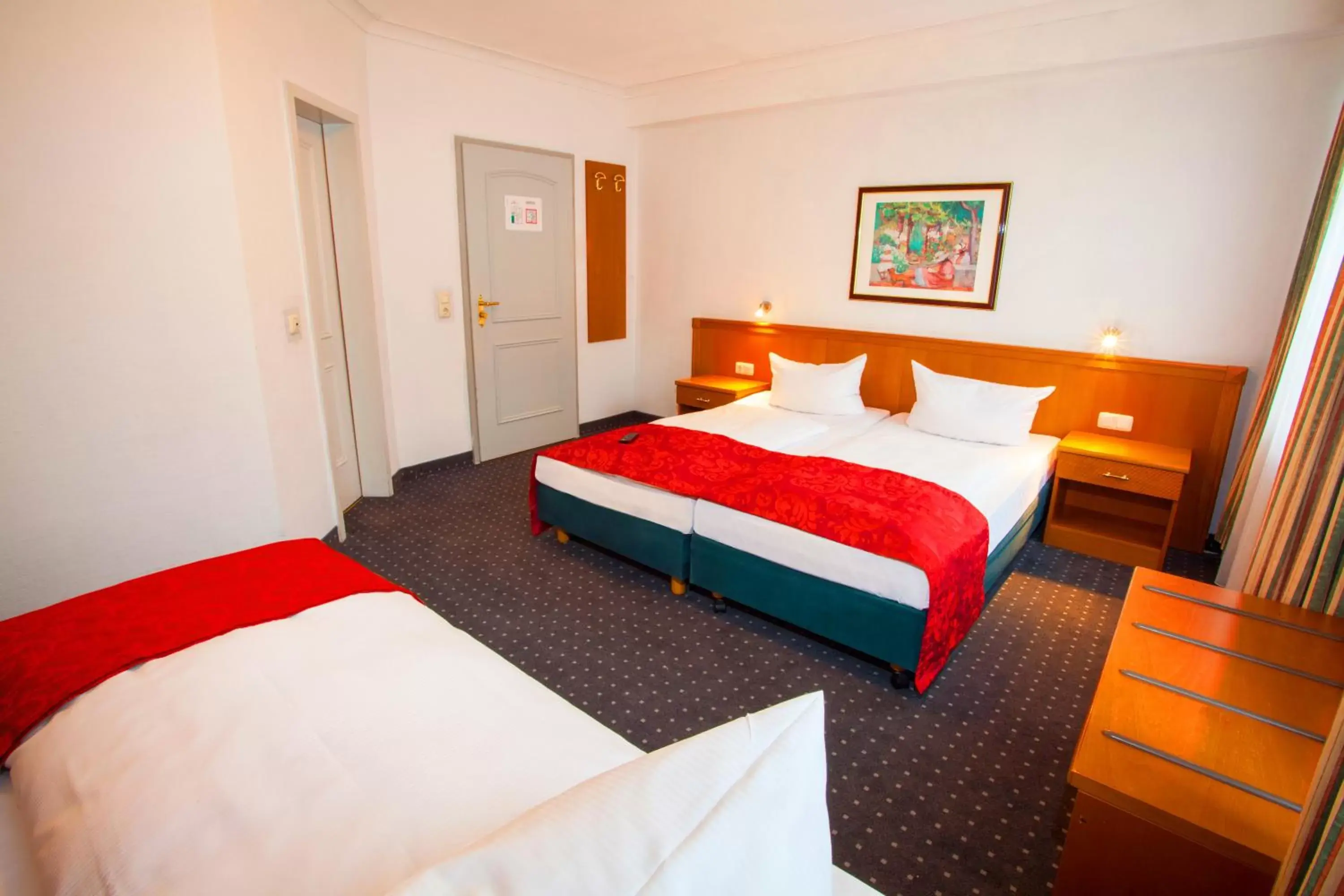 Triple Room in INA Hotel Royal Triple Room in INA Hotel Royal