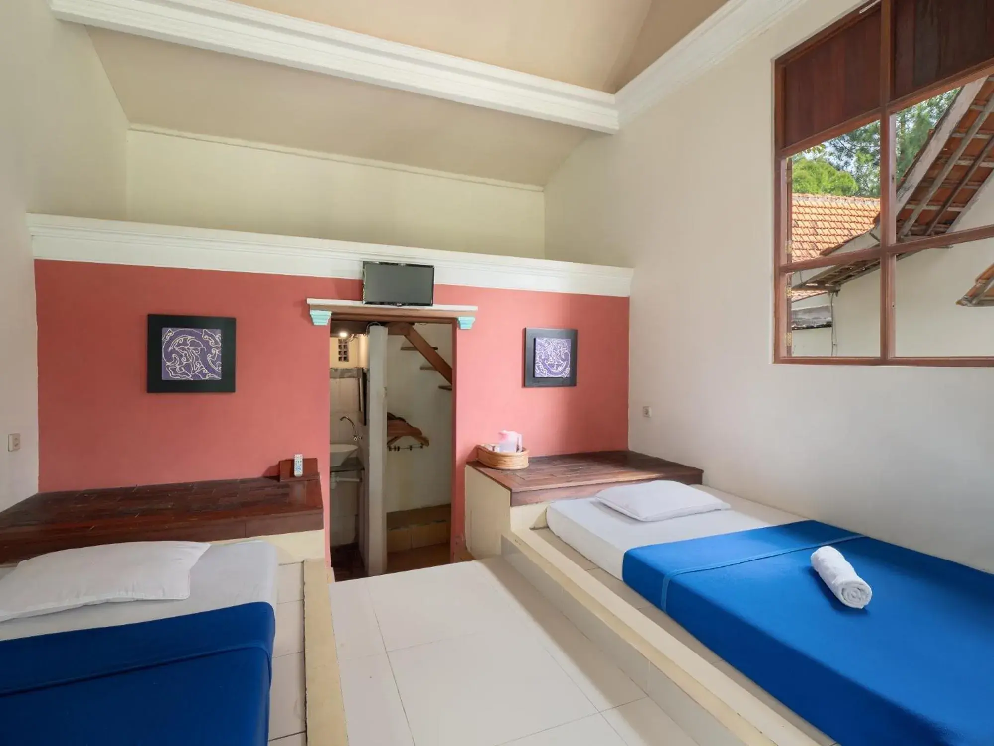 Standard Room in The Village Resort Bogor Powered by Archipelago Standard Room in The Village Resort Bogor Powered by Archipelago