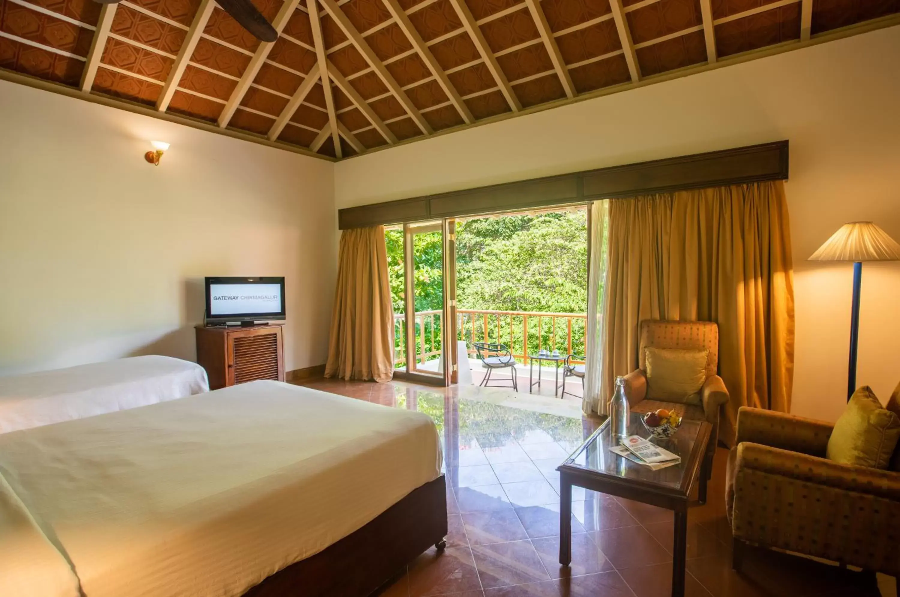 Cottage Queen Room with Garden View in Gateway Chikmagalur Cottage Queen Room with Garden View in Gateway Chikmagalur