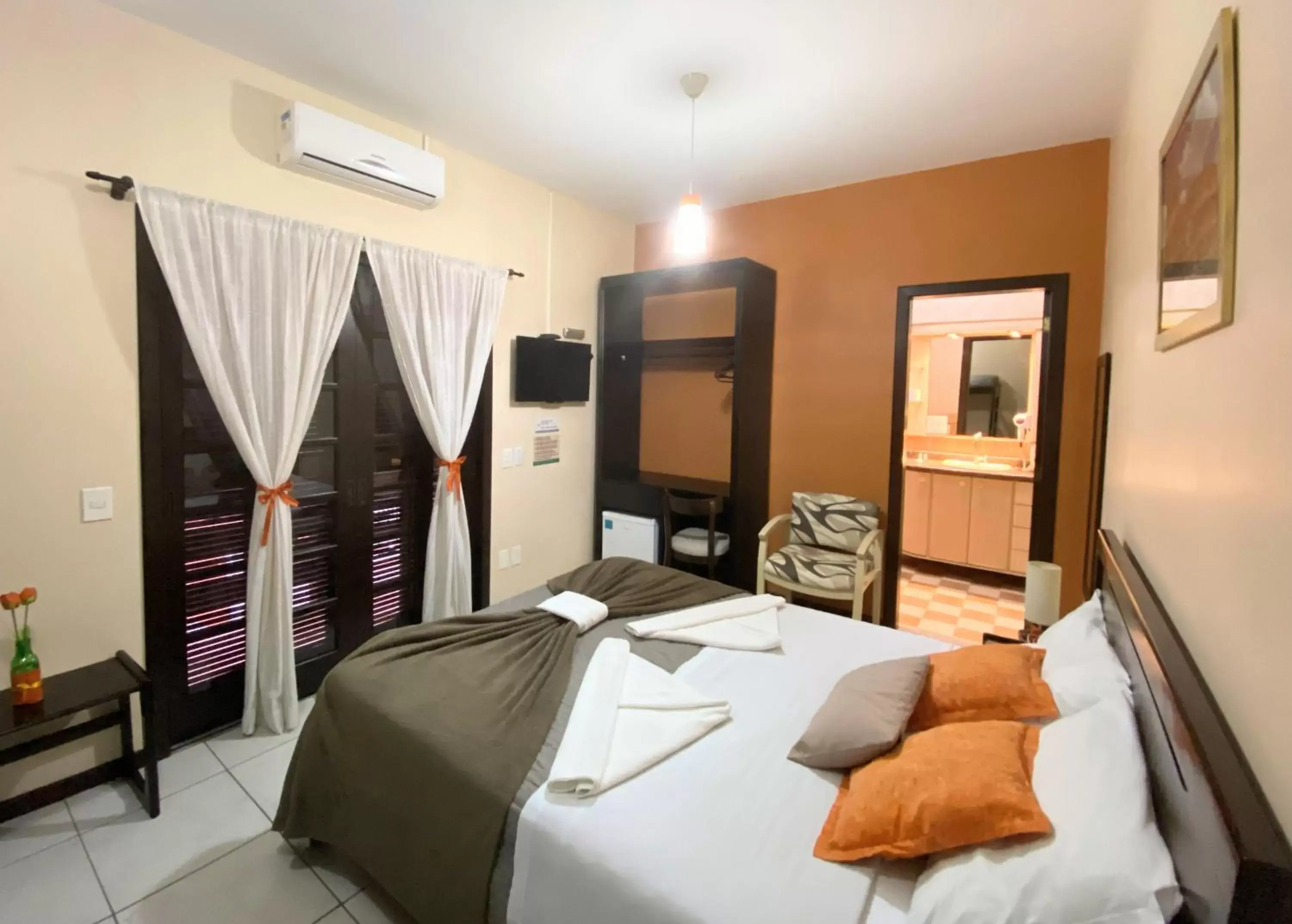 Deluxe Double Room with Balcony in Pousada Canasvieiras Deluxe Double Room with Balcony in Pousada Canasvieiras