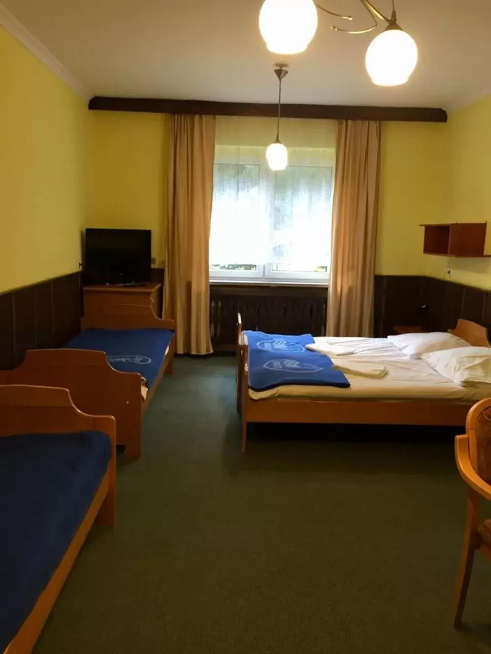Quadruple Room in OWR Relax - Hostel położony blisko atrakcji turystycznych Quadruple Room in OWR Relax - Hostel położony blisko atrakcji turystycznych
