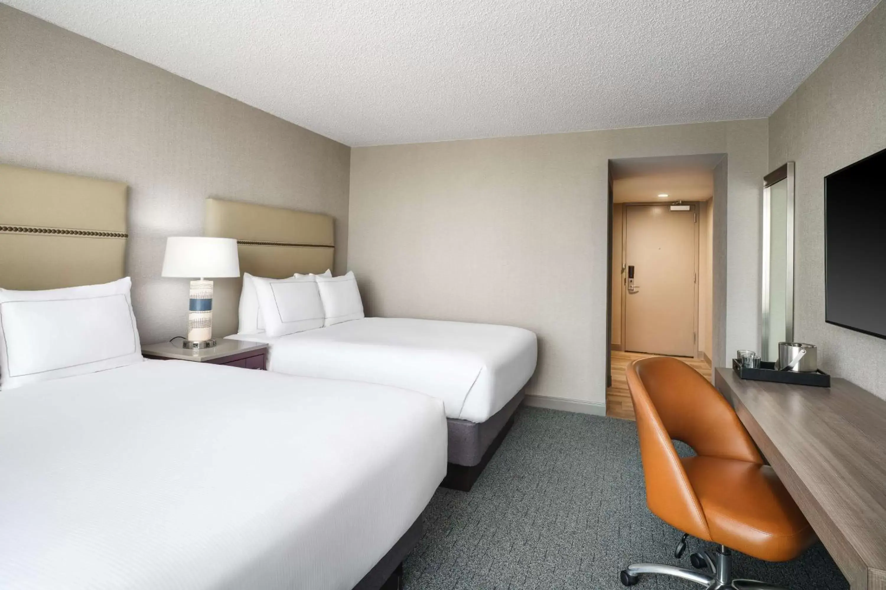 Queen Room with Two Queen Beds and Tub - Mobility and Hearing Access in Hilton Richardson Dallas, TX Queen Room with Two Queen Beds and Tub - Mobility and Hearing Access in Hilton Richardson Dallas, TX