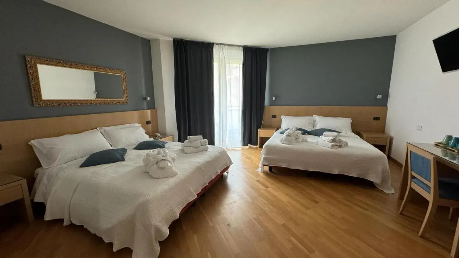 Comfort Quadruple Room in Hotel Oasi Wellness & Spa Comfort Quadruple Room in Hotel Oasi Wellness & Spa