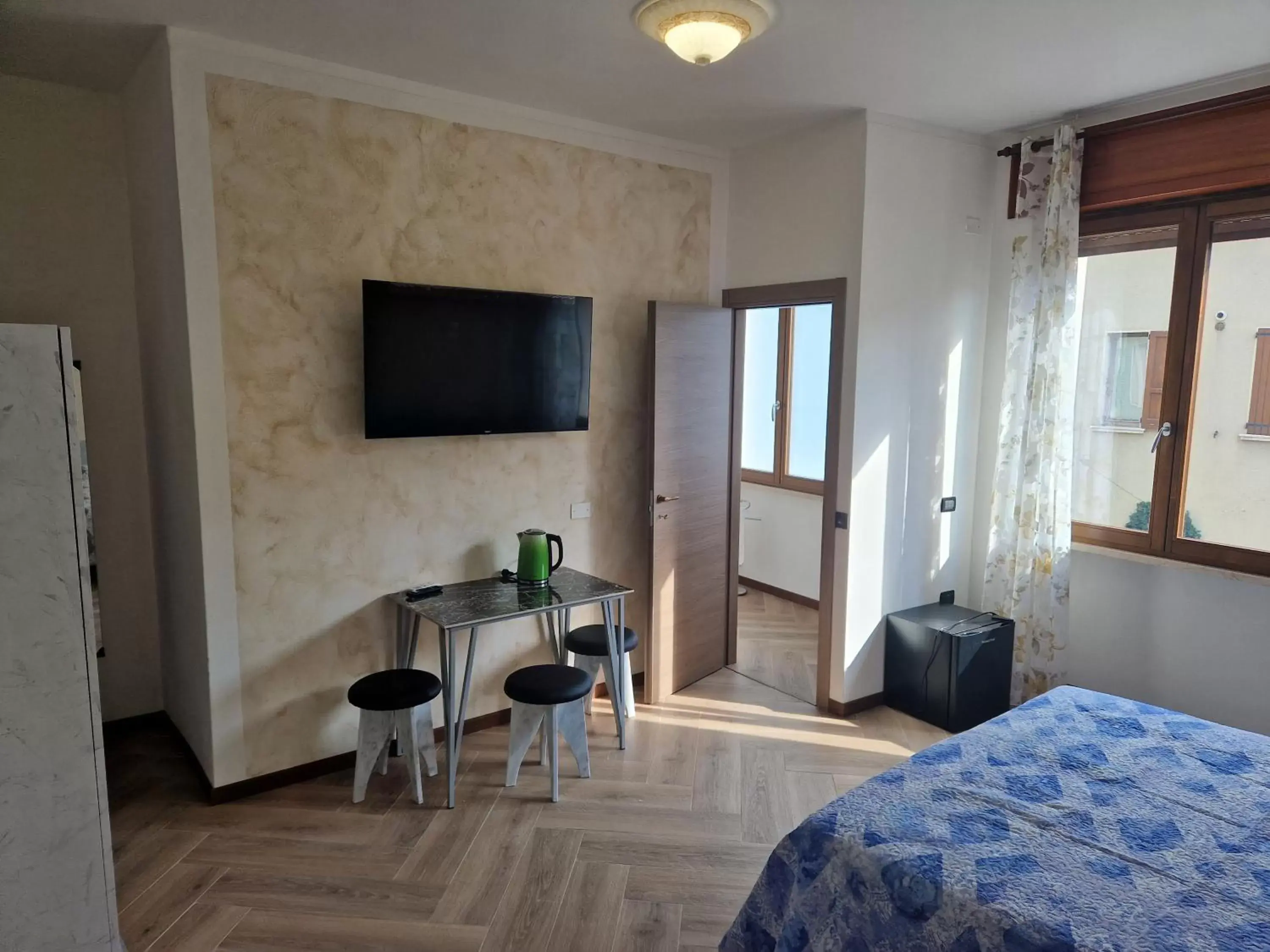 Triple Room with Private Bathroom in Le Rustiche Foresteria Triple Room with Private Bathroom in Le Rustiche Foresteria