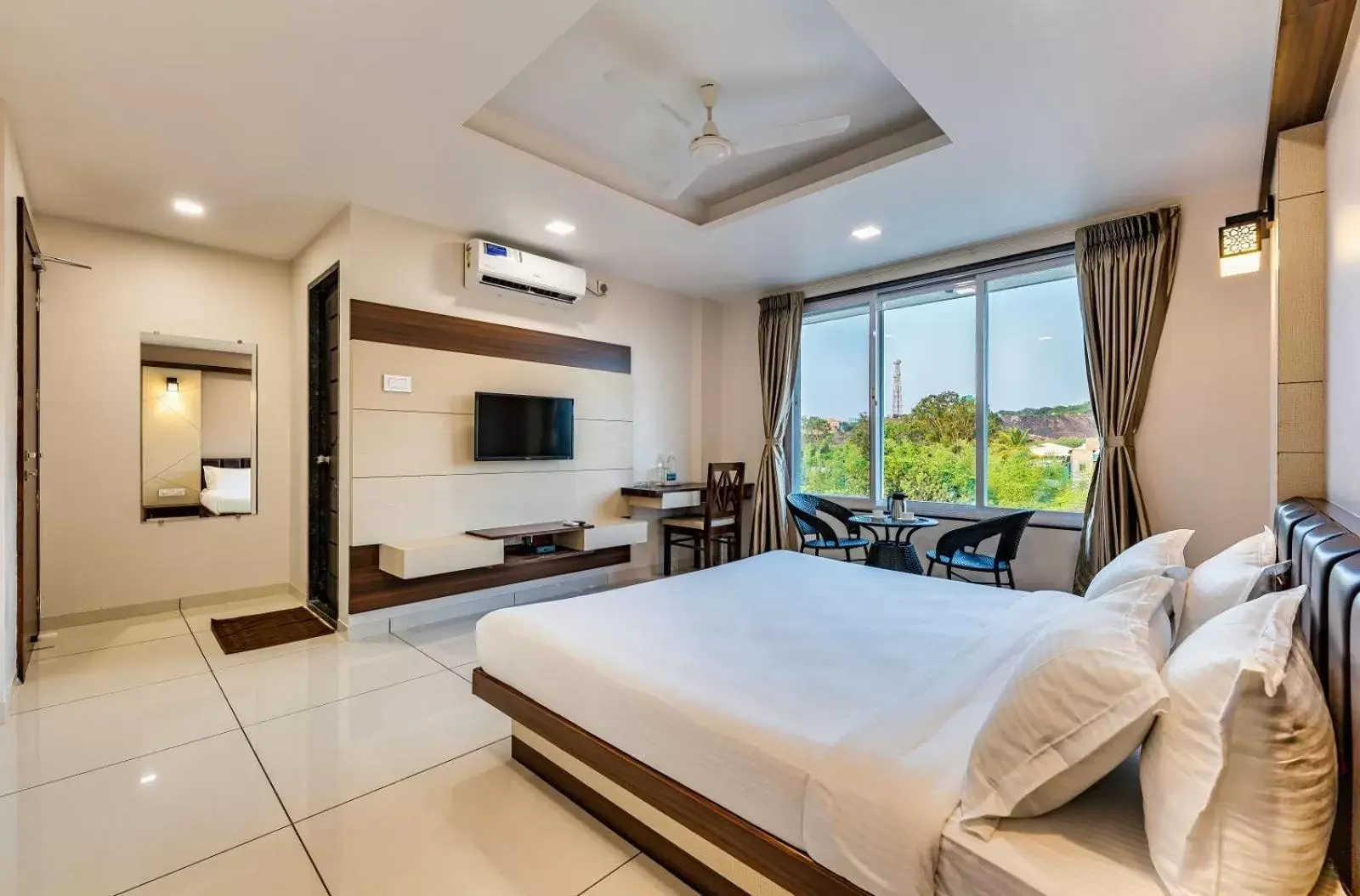 Standard Double Room with Fan - single occupancy in Hotel Grand Indu, 3 Star Kolhapur Standard Double Room with Fan - single occupancy in Hotel Grand Indu, 3 Star Kolhapur