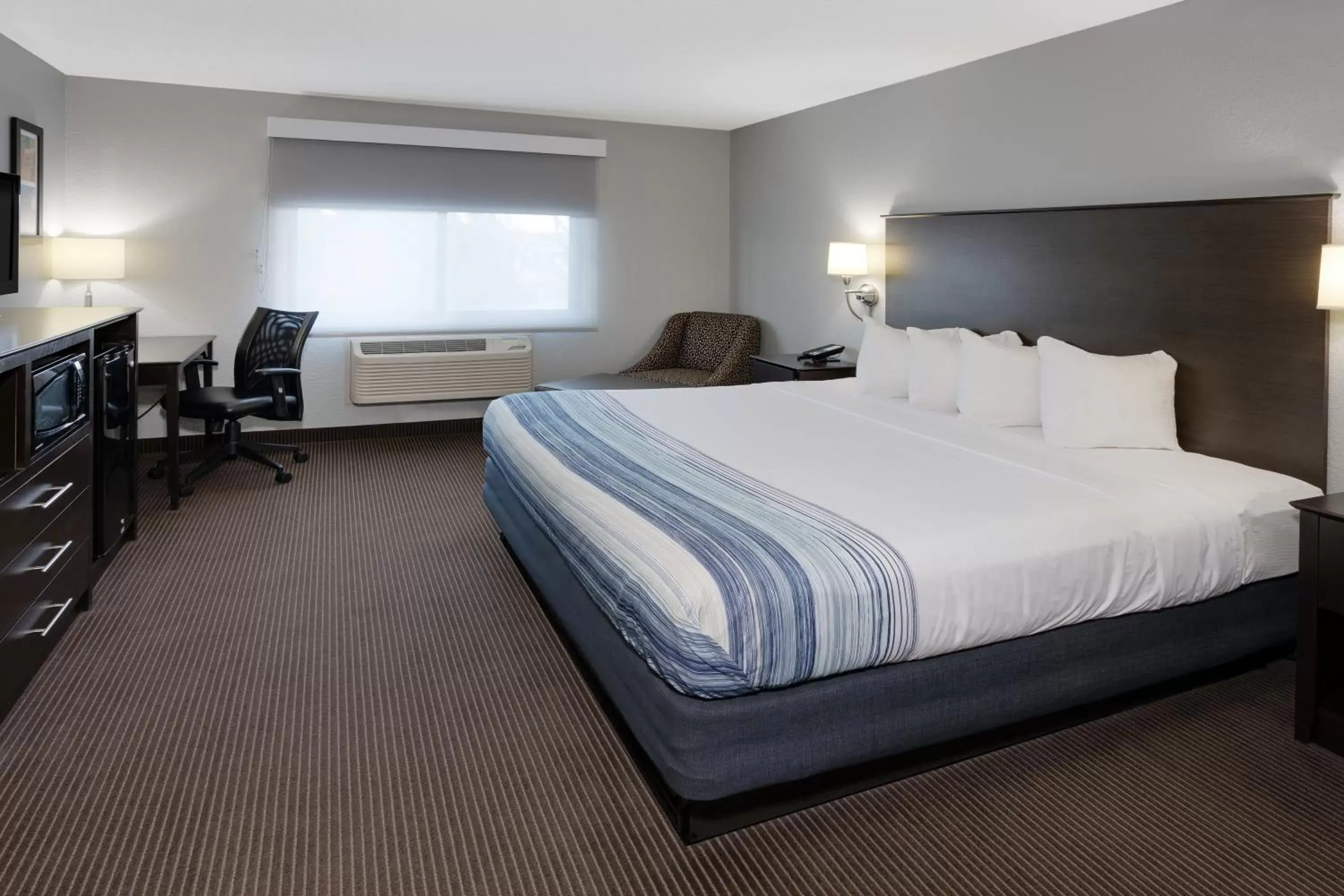 King Room - Mobility Access/Non-Smoking in AmericInn by Wyndham Plover Stevens Point King Room - Mobility Access/Non-Smoking in AmericInn by Wyndham Plover Stevens Point