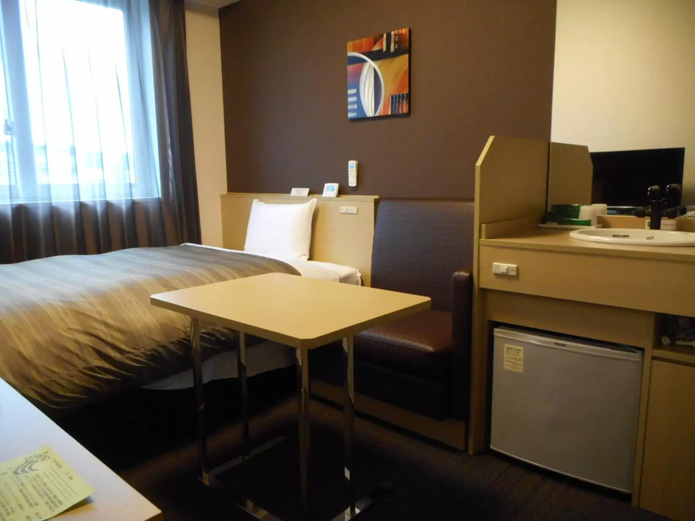 Single Room with Shared Bathroom - Smoking - West Building in Hotel Route-Inn Iwakiizumi Ekimae Single Room with Shared Bathroom - Smoking - West Building in Hotel Route-Inn Iwakiizumi Ekimae
