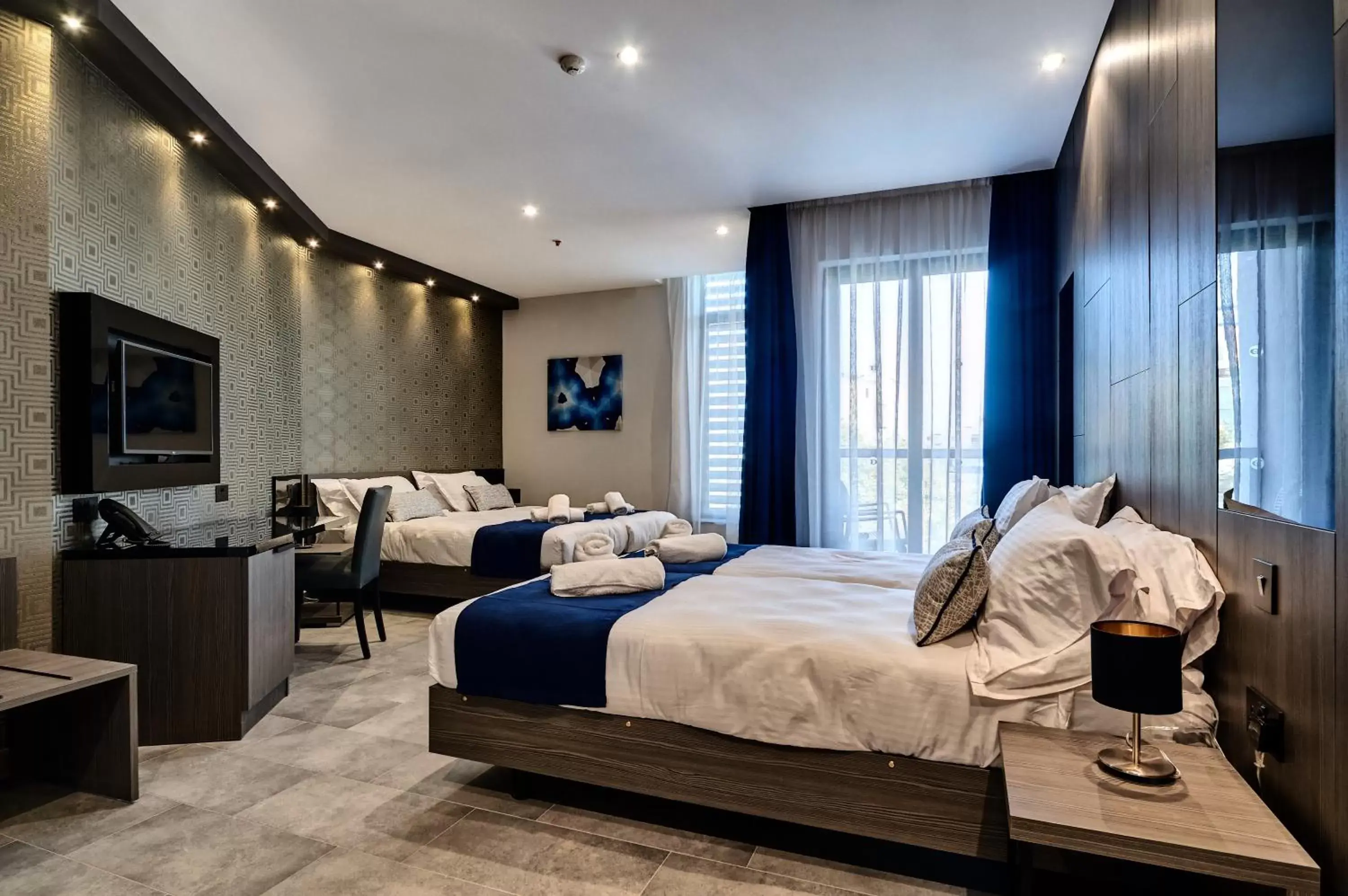 Superior Quadruple Room in The District Hotel Superior Quadruple Room in The District Hotel