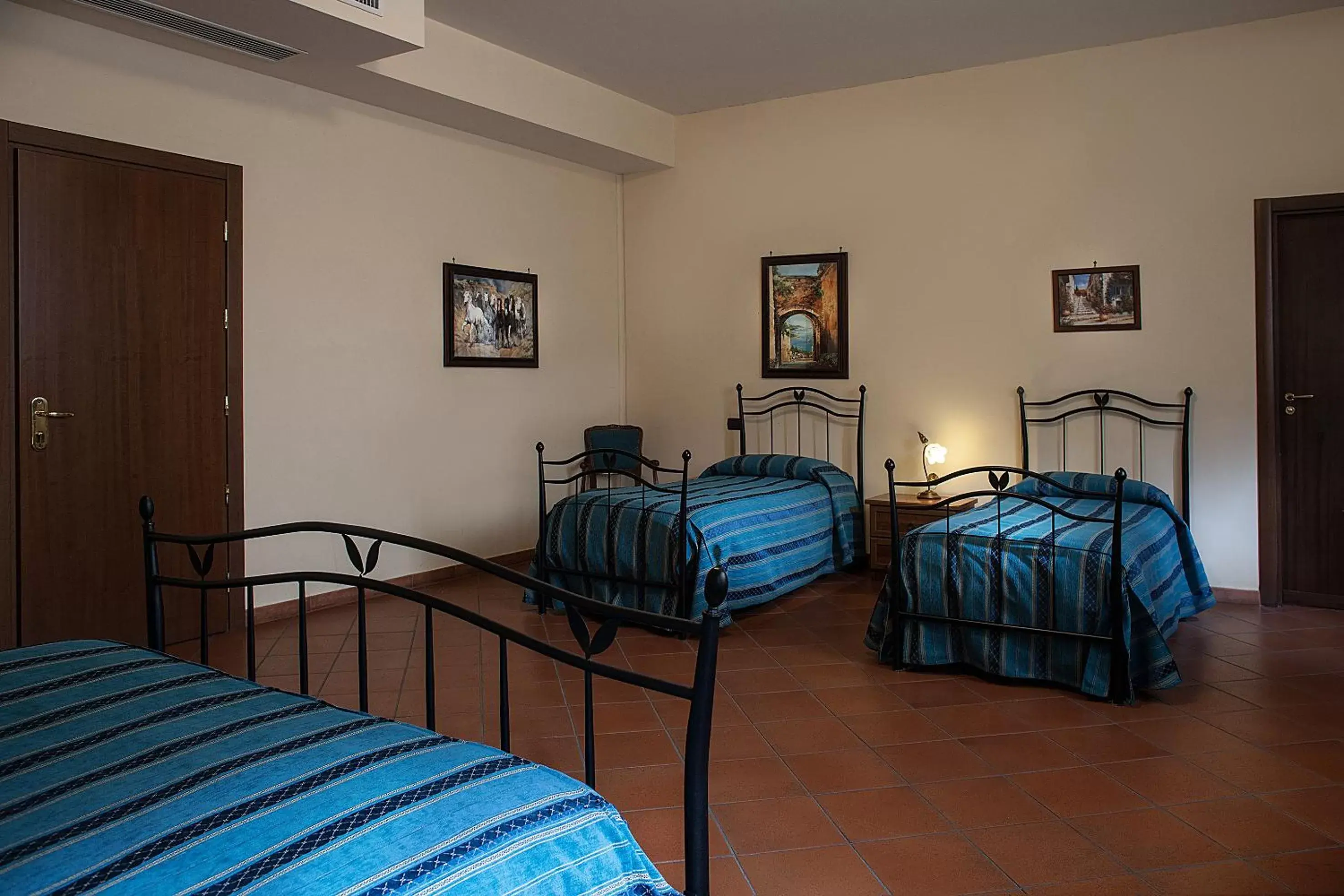 Quadruple Room in Grand Hotel Capodimonte Quadruple Room in Grand Hotel Capodimonte