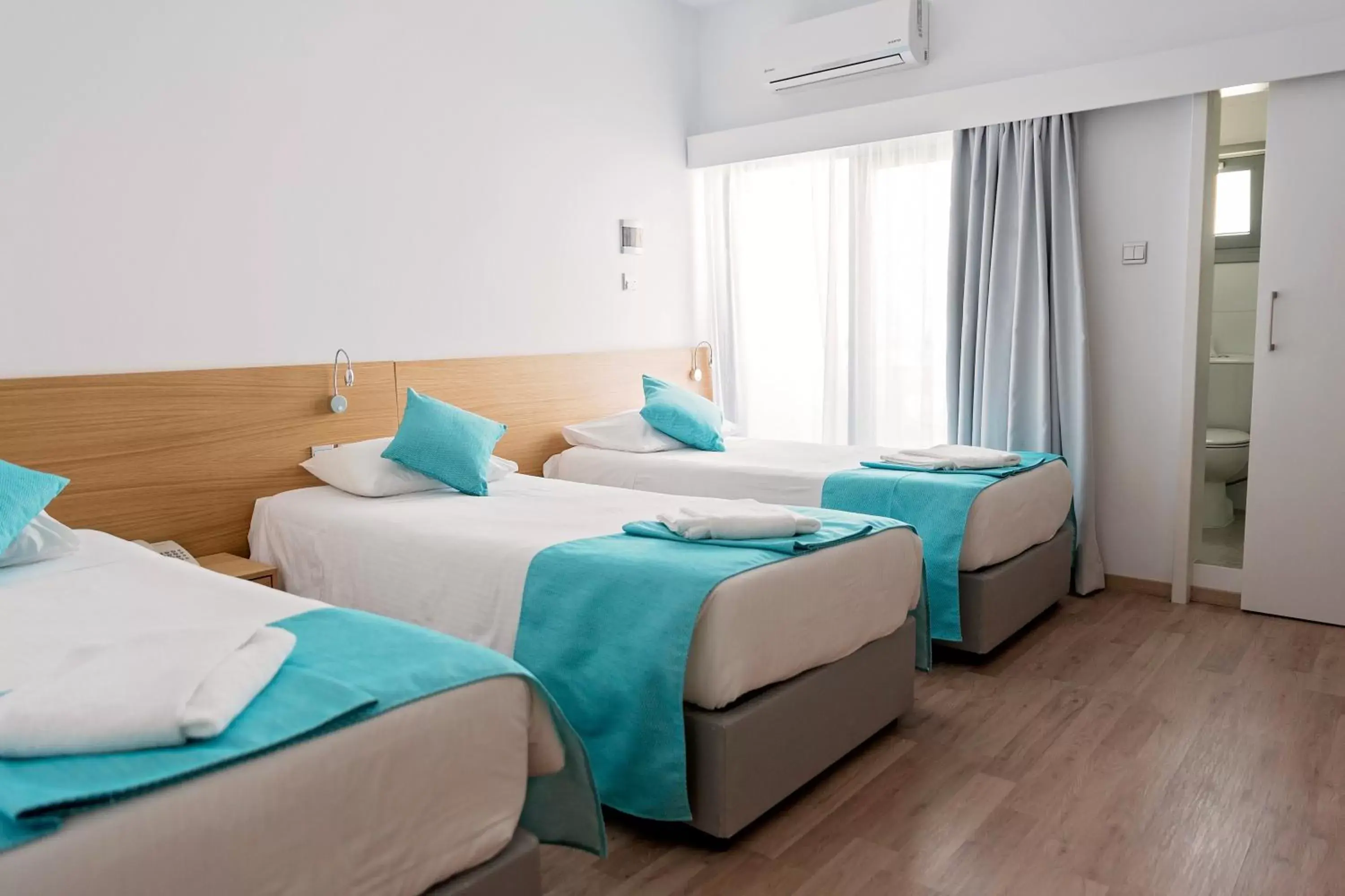 Triple Room in Pyramos Hotel Triple Room in Pyramos Hotel