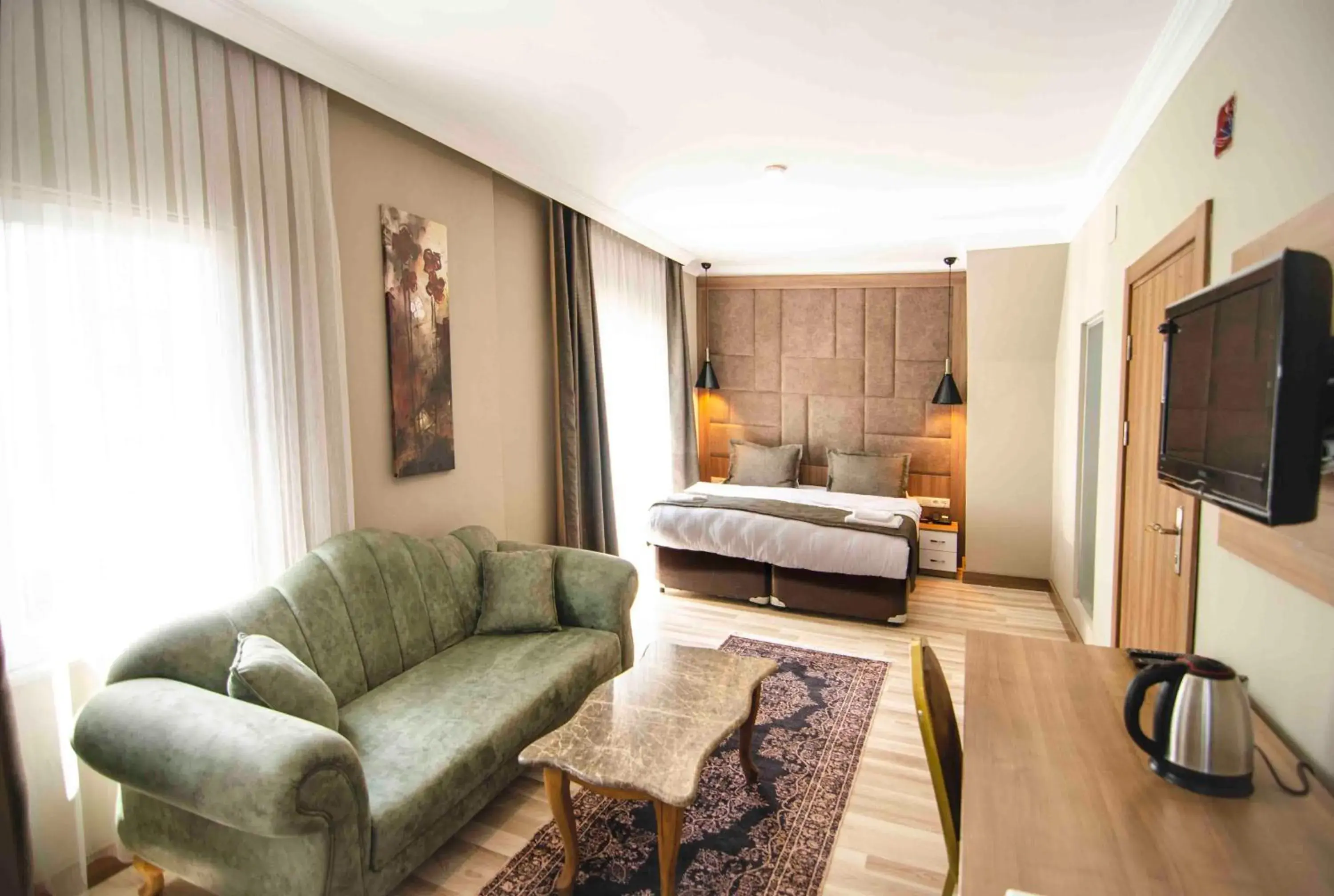 Deluxe Triple Room in Nova Suite Residence Deluxe Triple Room in Nova Suite Residence