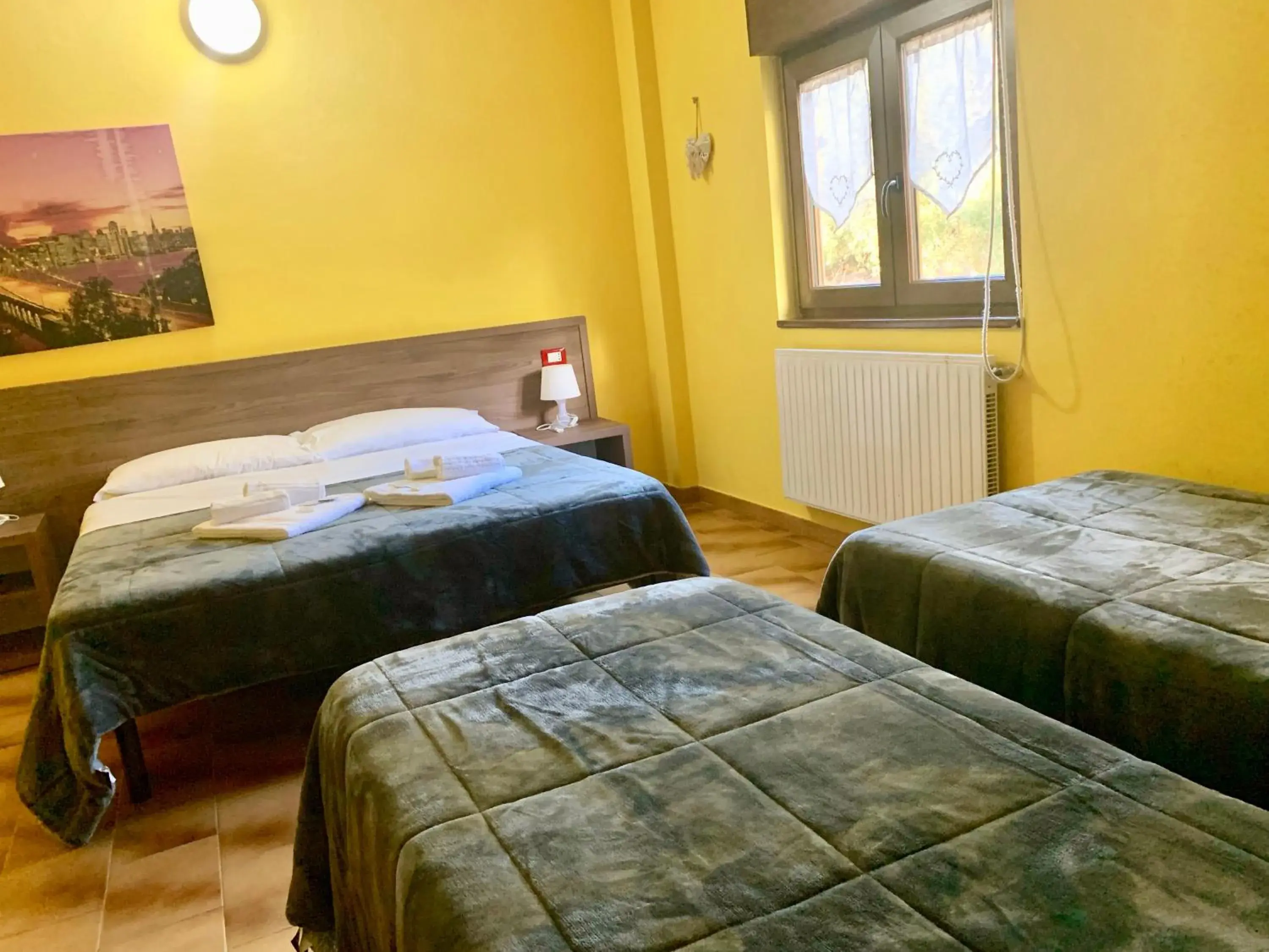 Quadruple Room in Hotel Miramonti Seulo Turismo Rurale Quadruple Room in Hotel Miramonti Seulo Turismo Rurale