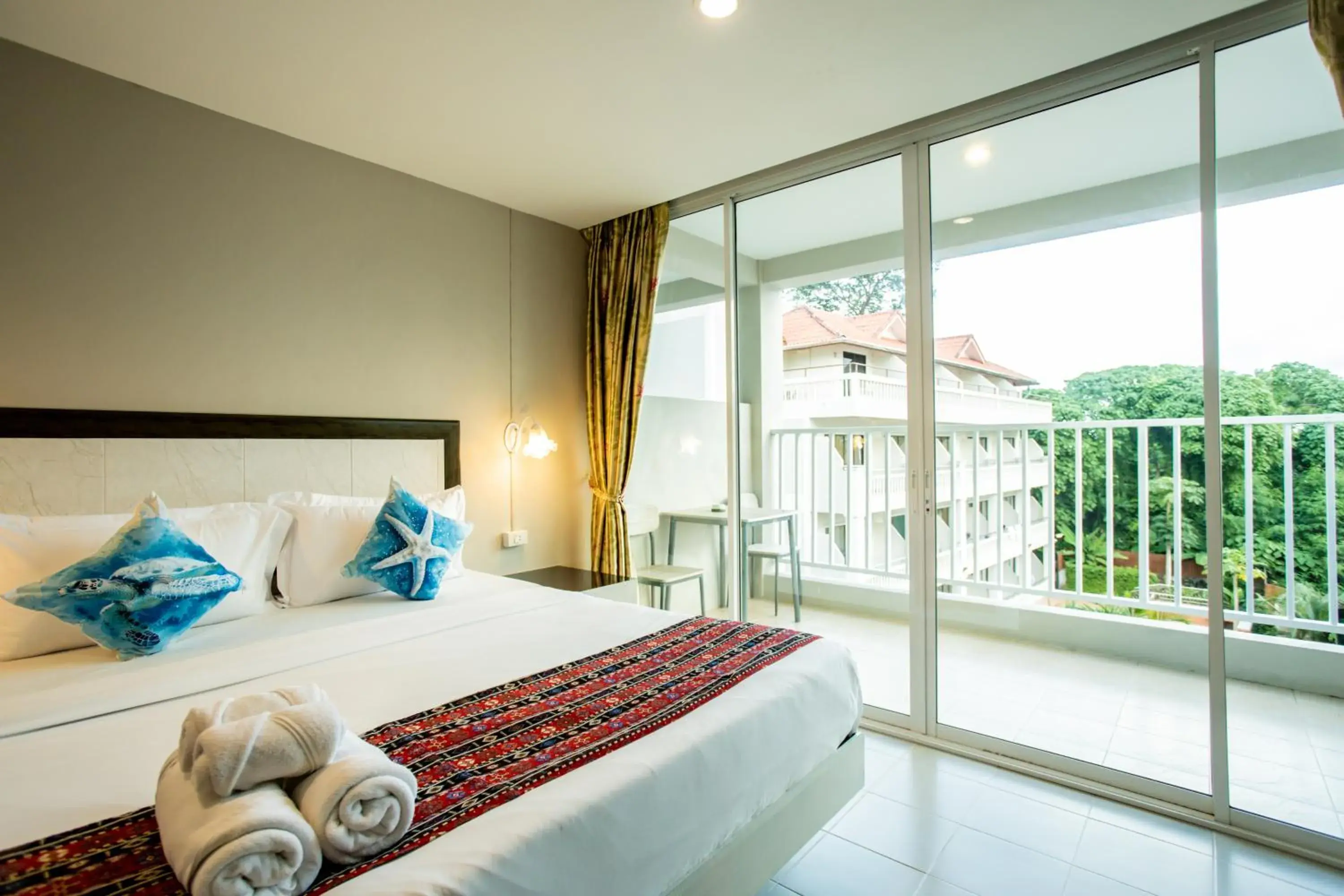 Deluxe Double Room with Balcony in Tri's Miracle Kata Beach Side Deluxe Double Room with Balcony in Tri's Miracle Kata Beach Side