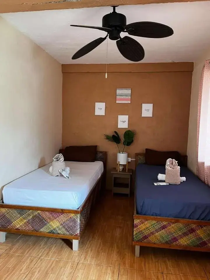 Twin Room with Balcony - single occupancy in On Board Panglao Beach Hostel & Resort with FREE MOTORBIKE Twin Room with Balcony - single occupancy in On Board Panglao Beach Hostel & Resort with FREE MOTORBIKE