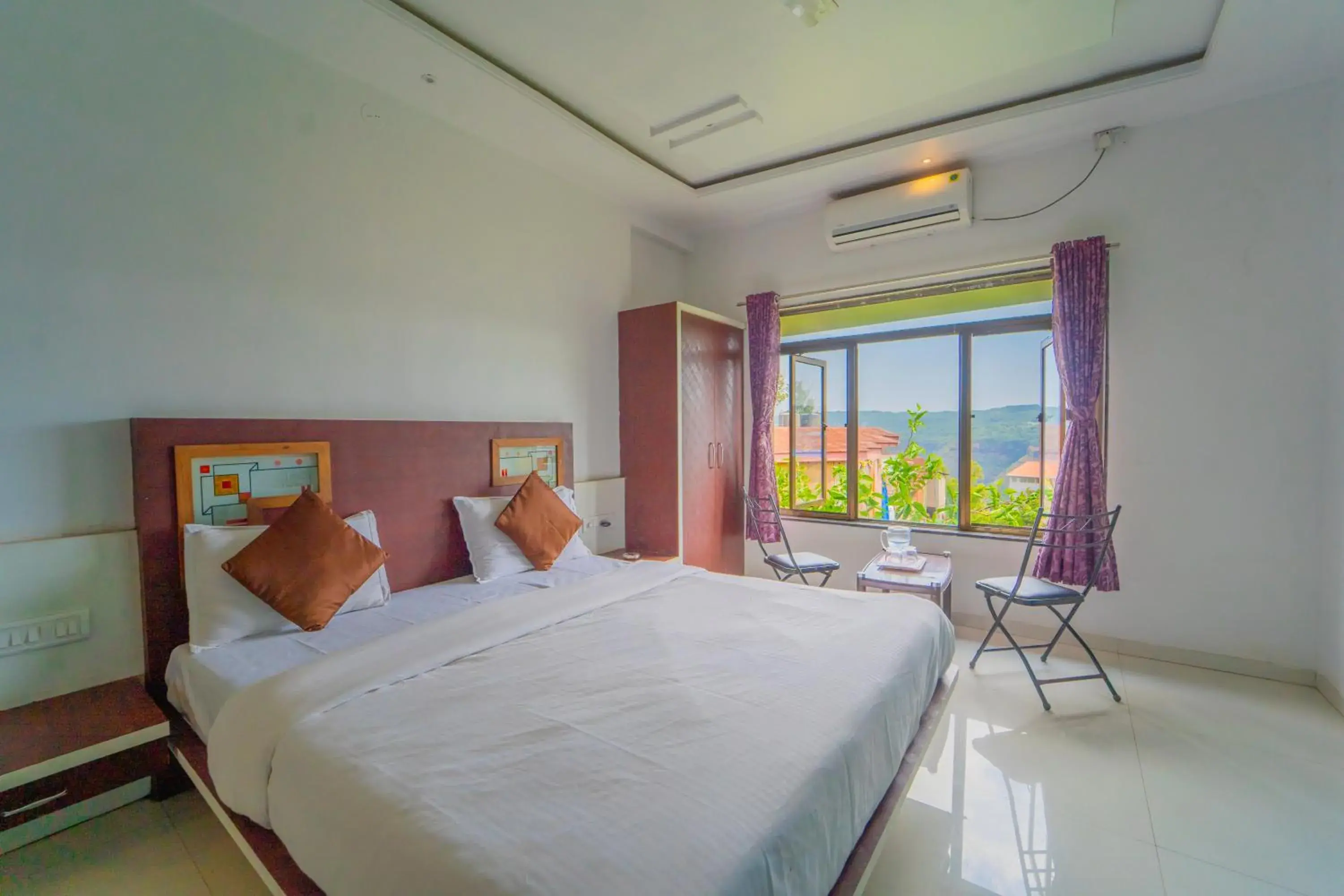 Deluxe Room in Veggies Residency Deluxe Room in Veggies Residency