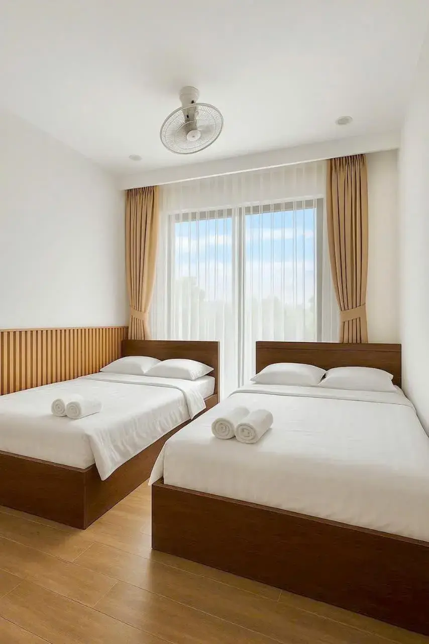 Superior Queen Room with Two Queen Beds in Nam Hội An Hotel - Near Vinpearl Nam Hội An Superior Queen Room with Two Queen Beds in Nam Hội An Hotel - Near Vinpearl Nam Hội An