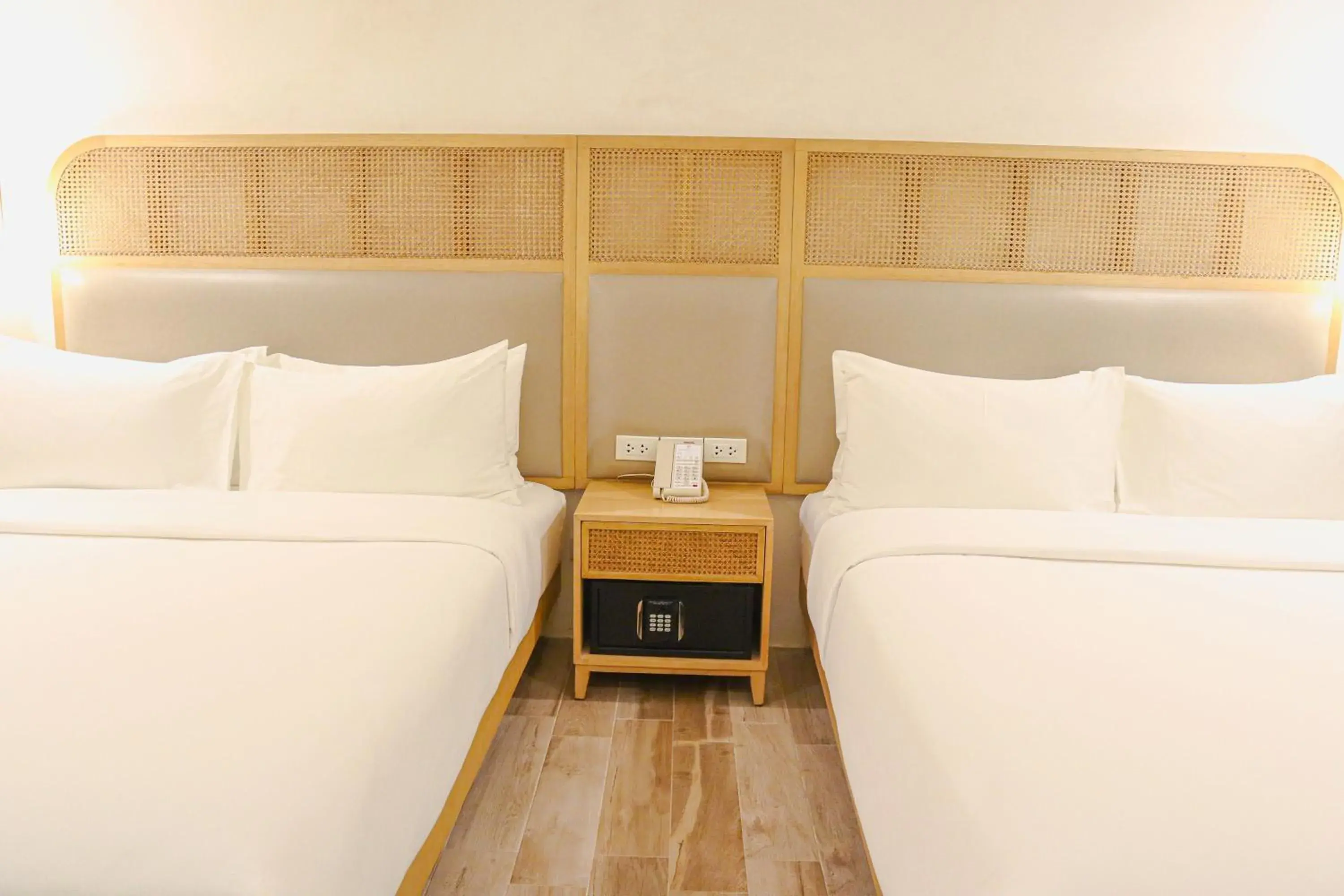 Premier Quadruple (2 Queen) - No Window in Mandarin Nest Boracay Premier Quadruple (2 Queen) - No Window in Mandarin Nest Boracay