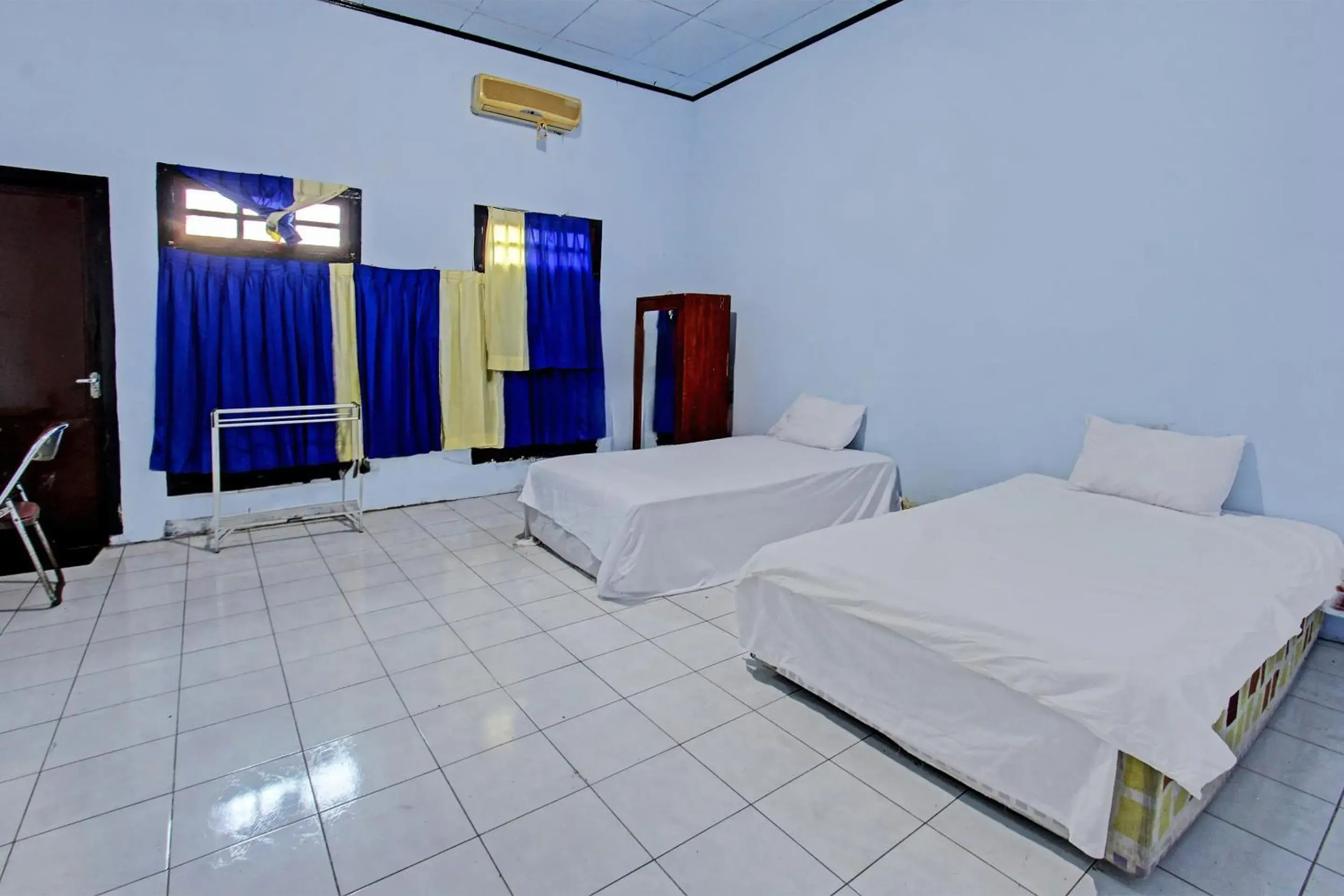 Deluxe Twin Room in Hotel O Mareje Sariguna Deluxe Twin Room in Hotel O Mareje Sariguna