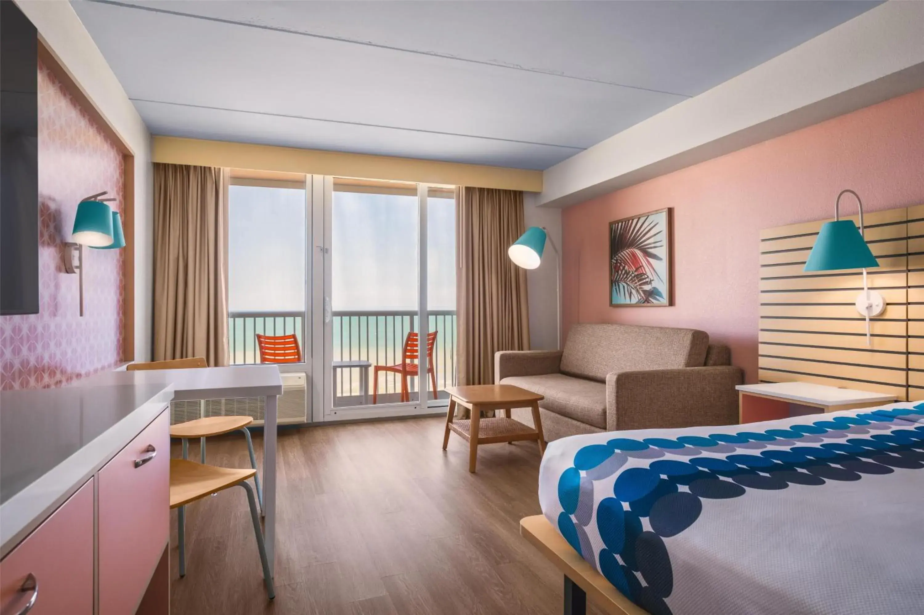 Family Room with One King Bed, One Queen Bed, Twin Bunk Beds and Oceanfront View in Golden Sands Carolina Beach Oceanfront, Tapestry by Hilton Family Room with One King Bed, One Queen Bed, Twin Bunk Beds and Oceanfront View in Golden Sands Carolina Beach Oceanfront, Tapestry by Hilton