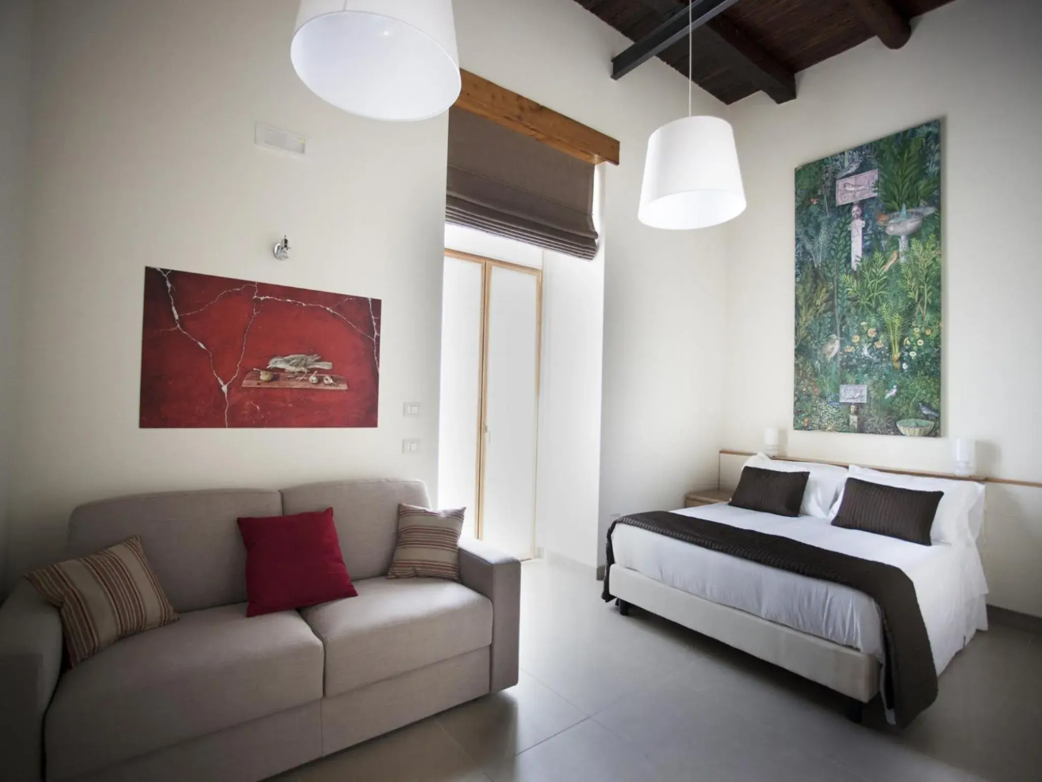 Quadruple Room with Balcony in Napolart Quadruple Room with Balcony in Napolart