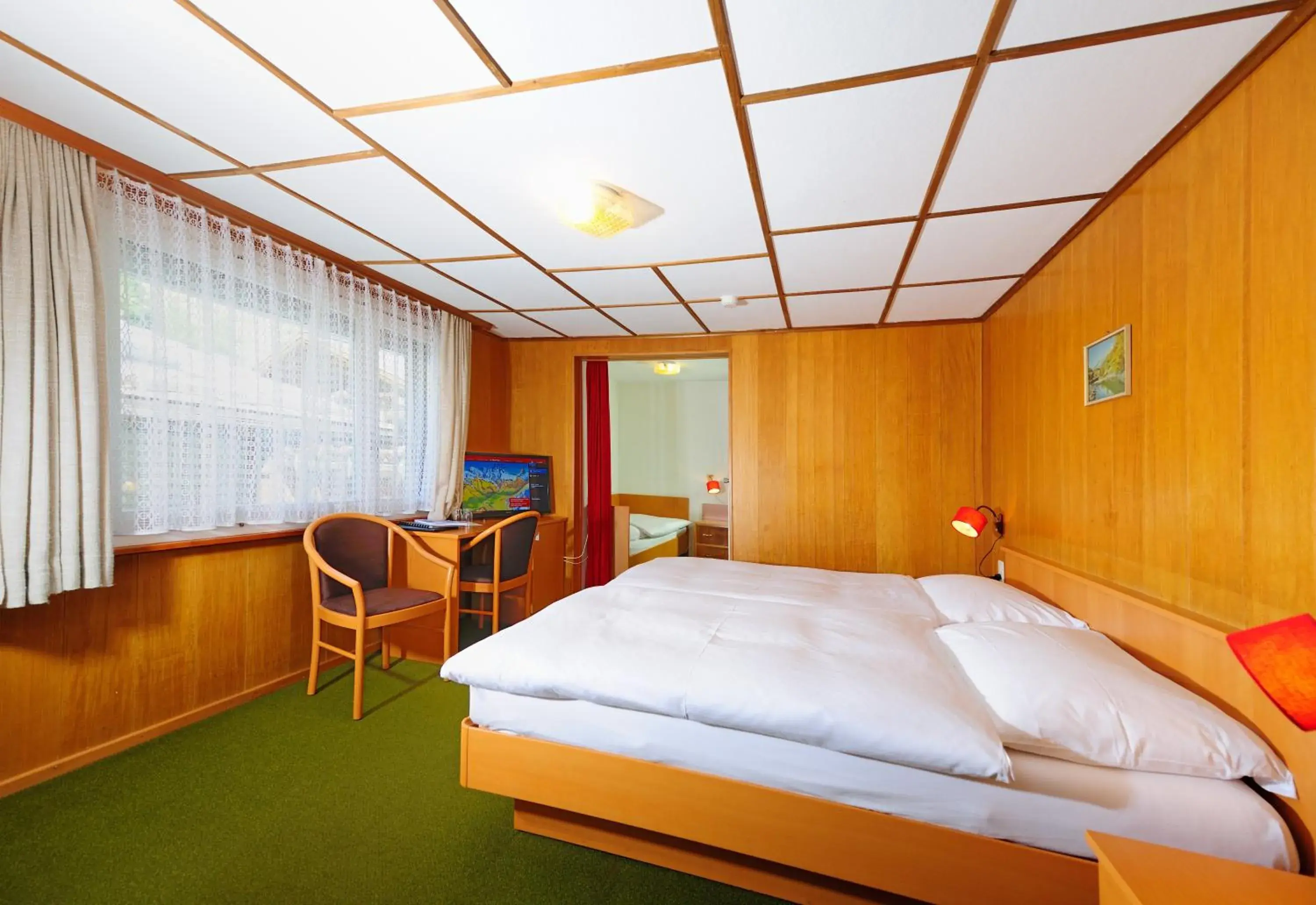 Triple Room in Hotel Alphubel Triple Room in Hotel Alphubel