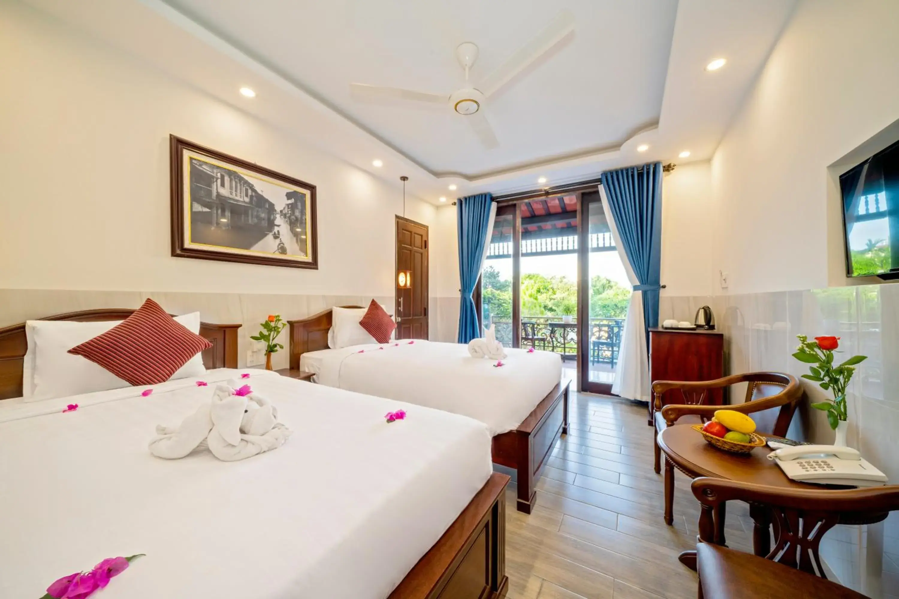 Deluxe Triple Room in Bonsai Villa Hoi An Deluxe Triple Room in Bonsai Villa Hoi An