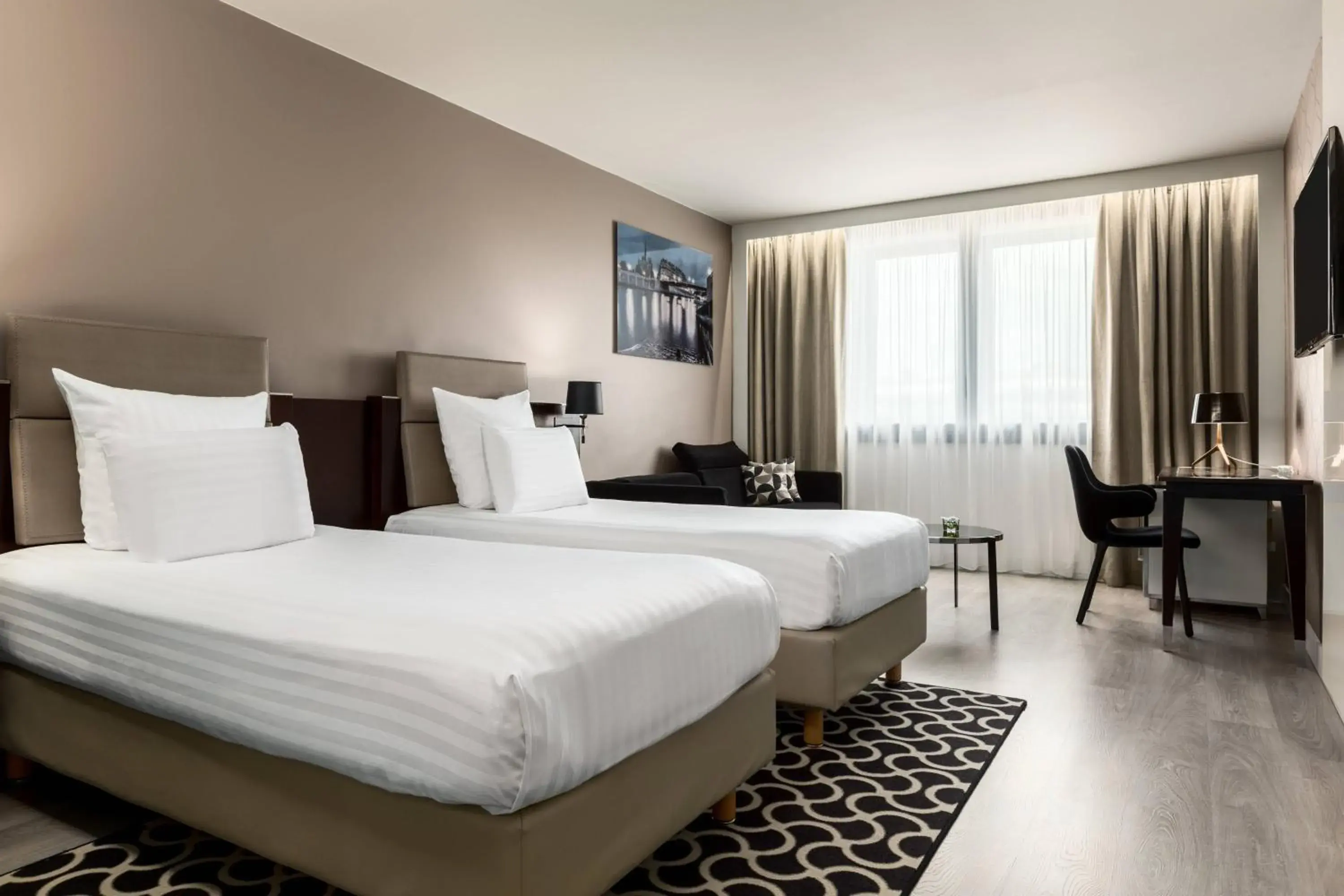 Family Room with Twin Beds and Sofa Bed in AC Hotel Paris Porte Maillot by Marriott Family Room with Twin Beds and Sofa Bed in AC Hotel Paris Porte Maillot by Marriott