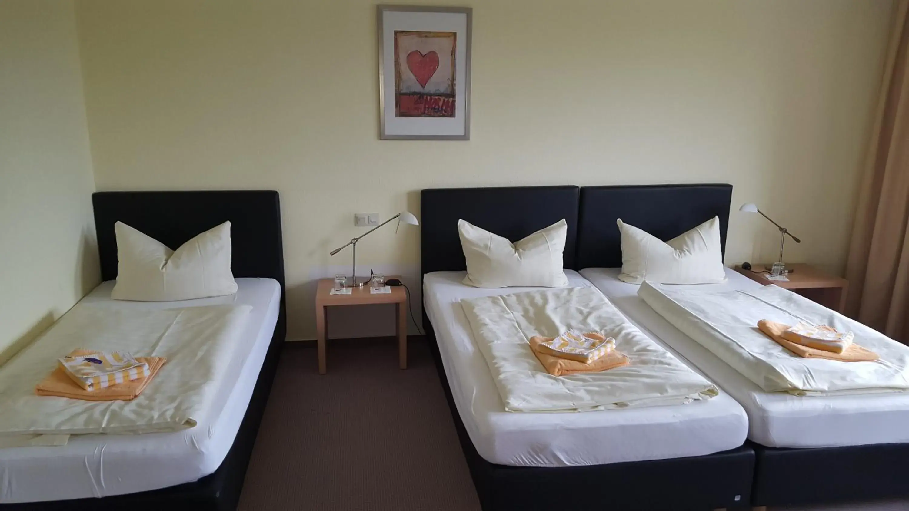 Triple Room in Hotel Brückentor Triple Room in Hotel Brückentor