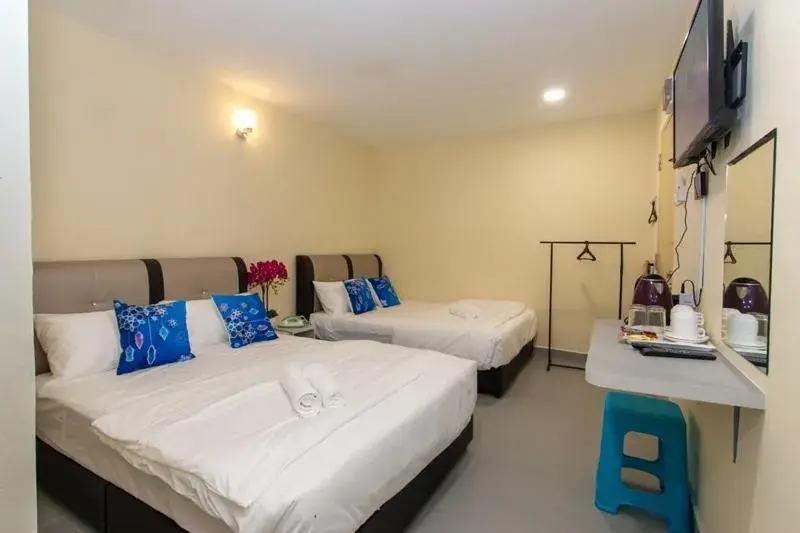 Standard Quadruple Room in Southern Tip Hotel Standard Quadruple Room in Southern Tip Hotel