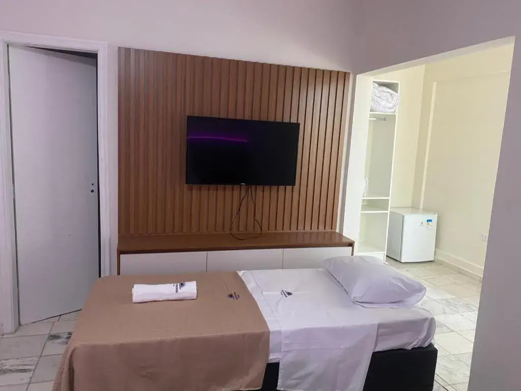 Superior Quadruple Room in Pousada Sol da Enseada Guarujá Inn - Piscina Aquecida Superior Quadruple Room in Pousada Sol da Enseada Guarujá Inn - Piscina Aquecida